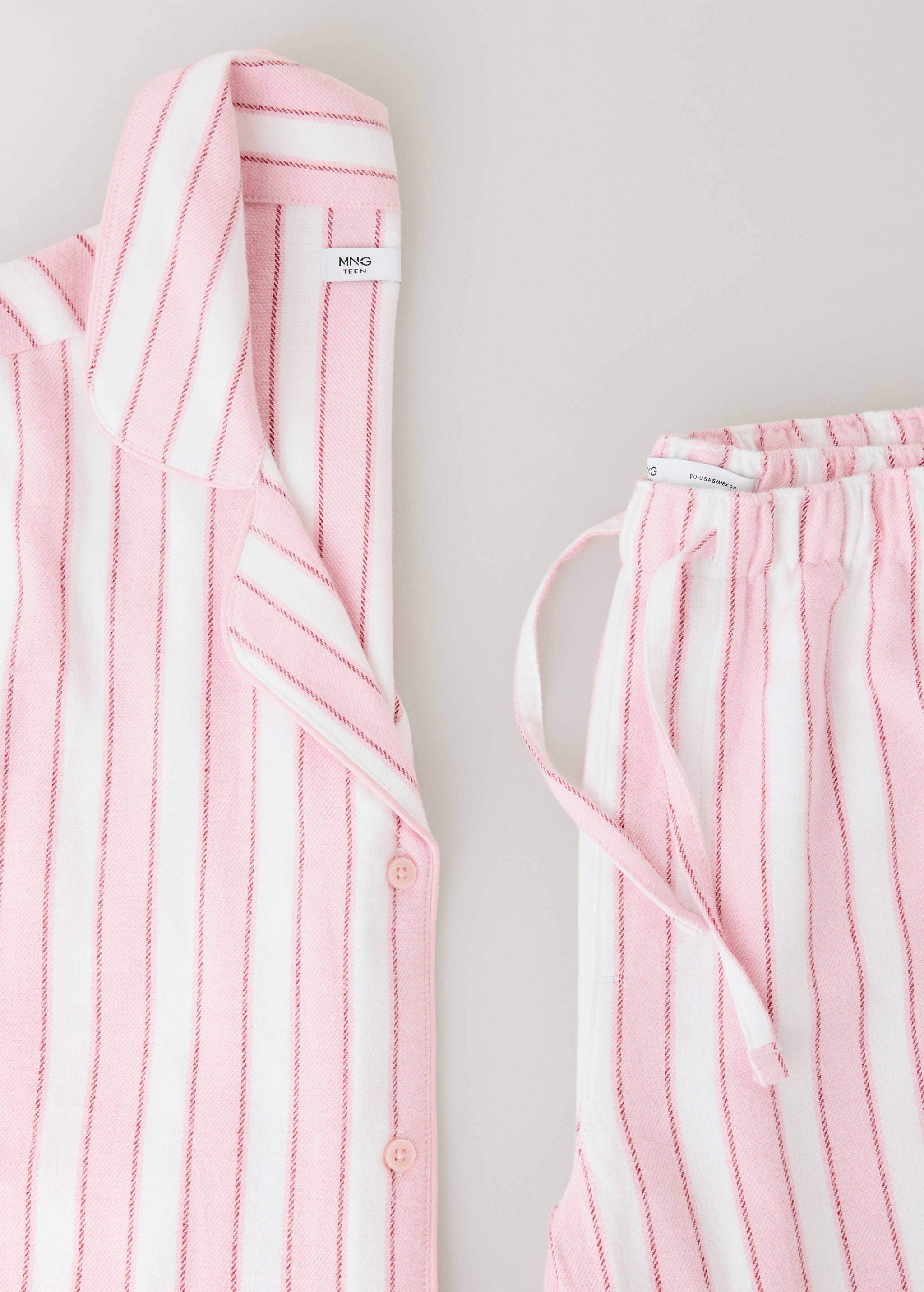 Striped cotton pyjamas with contrast piping - Details of the article 0