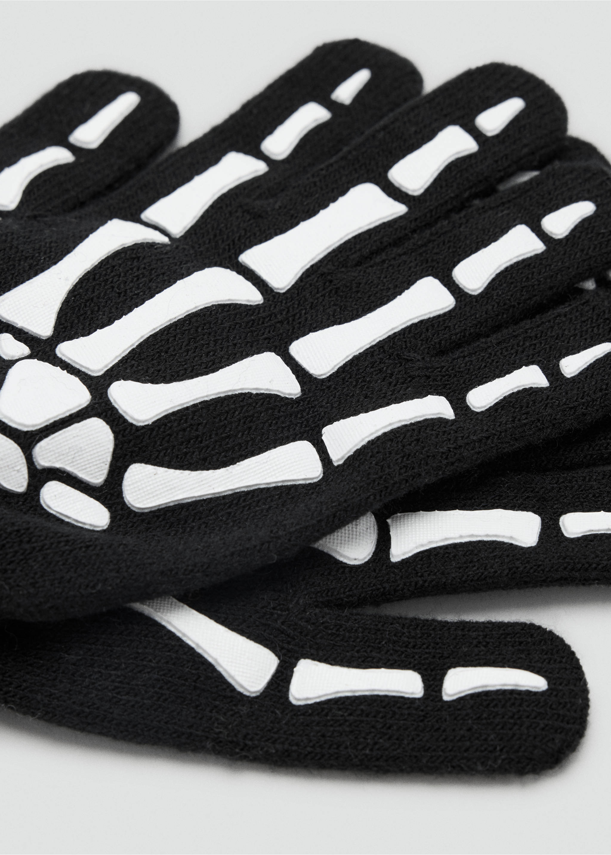 Skeleton knit gloves - Details of the article 1, Black. Ref: 37076336-00.