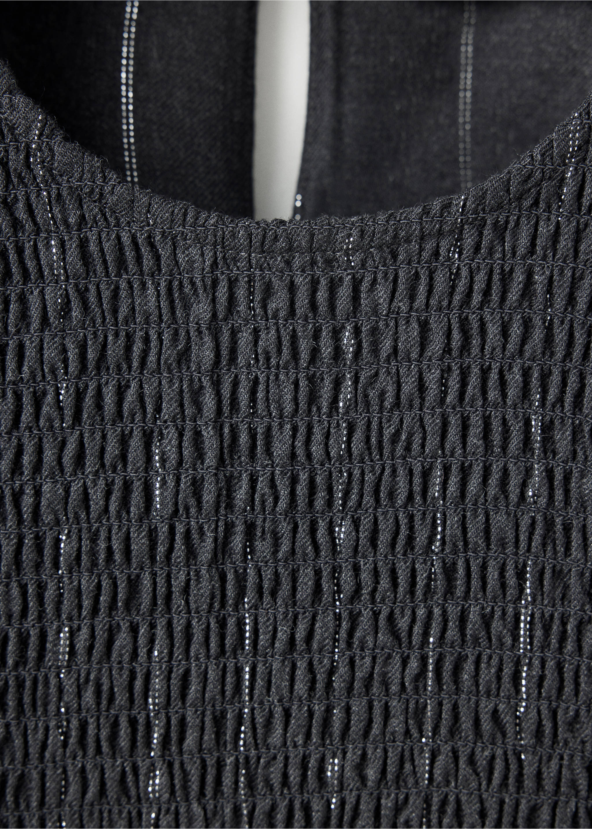 Metallic-thread smocked blouse - Details of the article 8, Charcoal. Ref: 37076369-00.