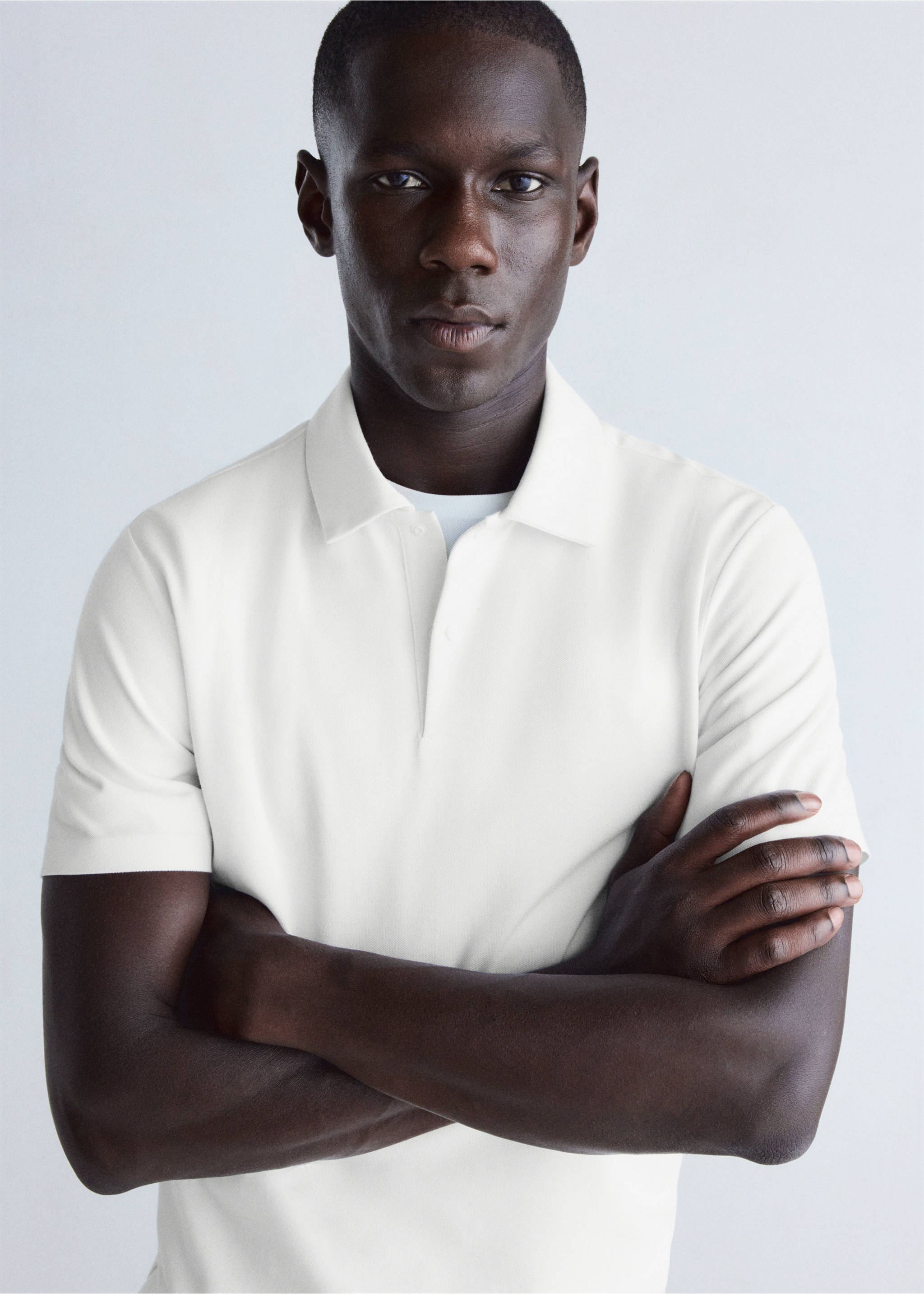 Slim-fit Thermolite® polo shirt - Details of the article 1, Off White. Ref: 37076727-00.