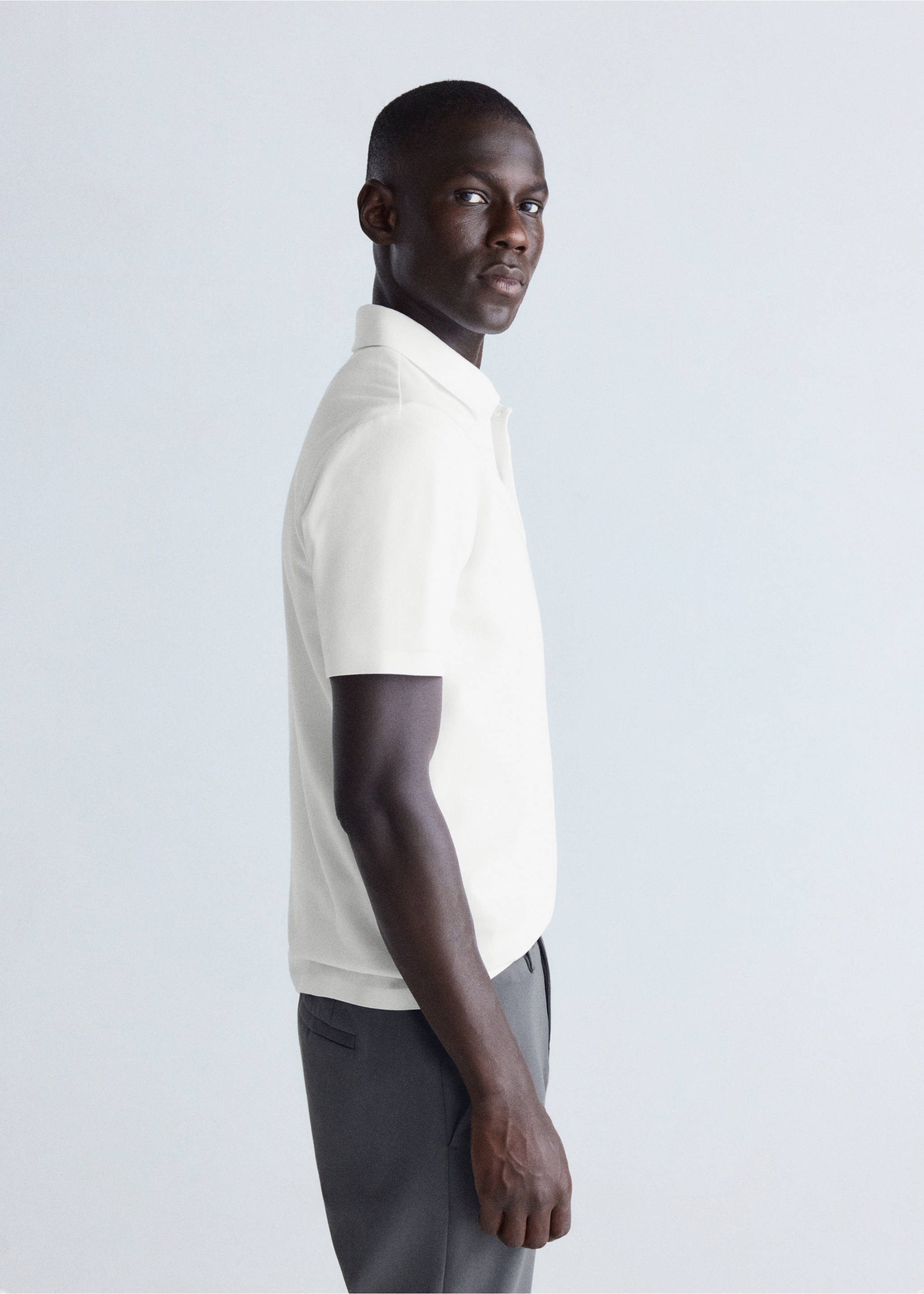Slim-fit Thermolite® polo shirt - Details of the article 2, Off White. Ref: 37076727-00.