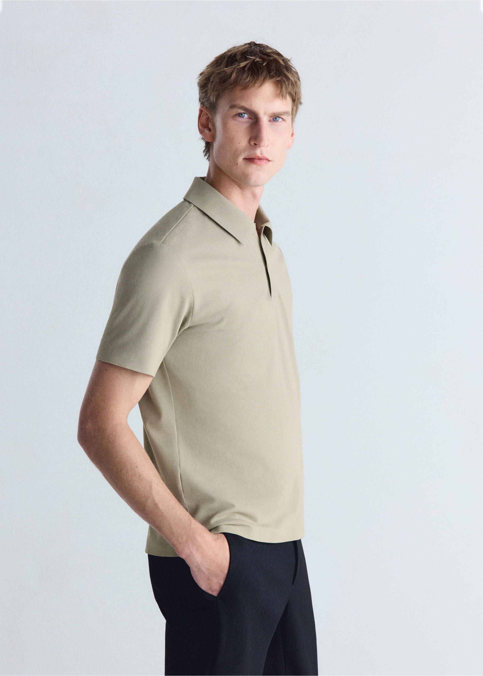 Slim-fit Thermolite® polo shirt - Details of the article 2, Medium Brown. Ref: 37076727-00.