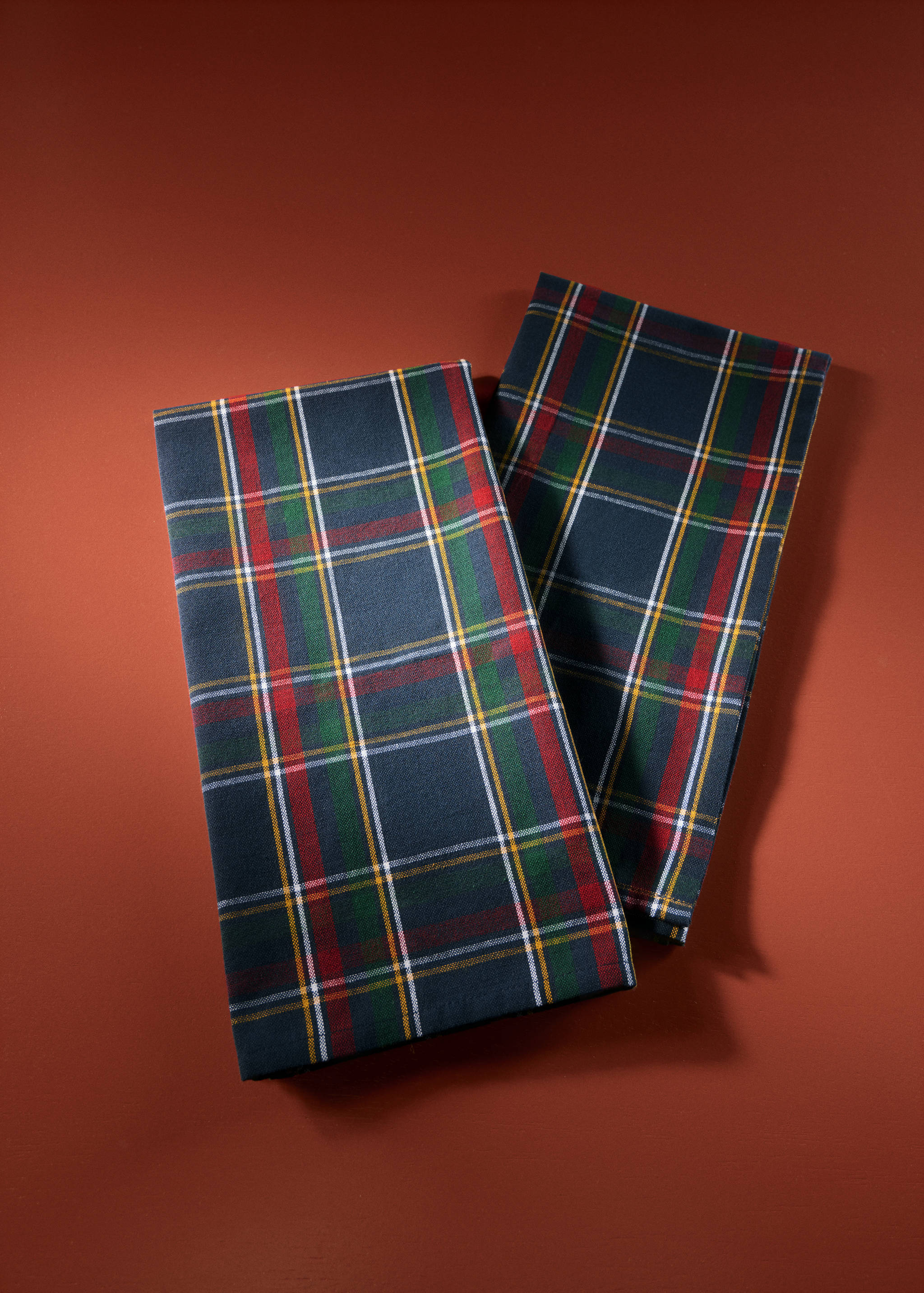 Set of dark navy blue tartan check kitchen towels.