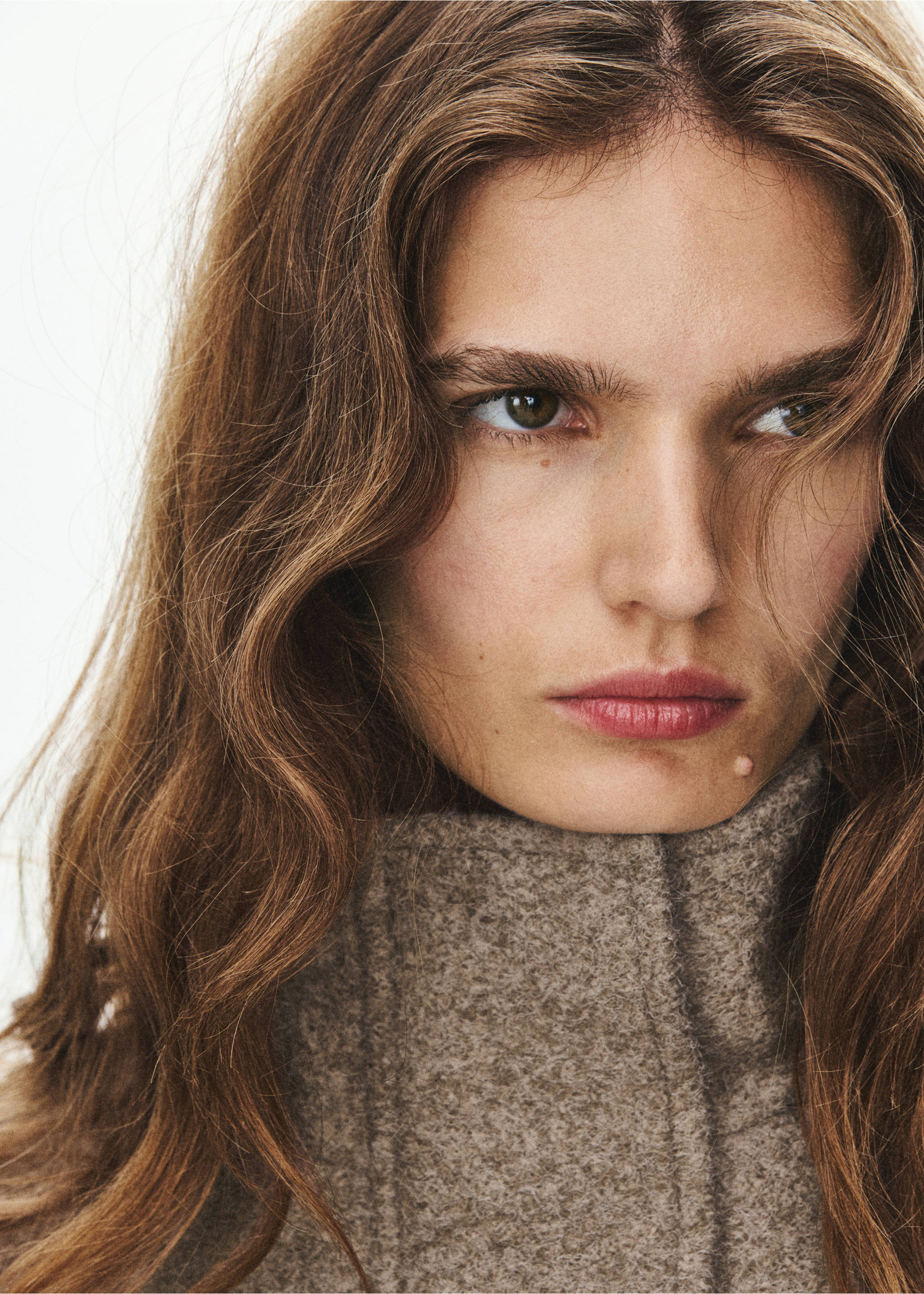 Close-up of a brown coat with a high collar on a model., Medium Brown. Ref: 37077115-00.