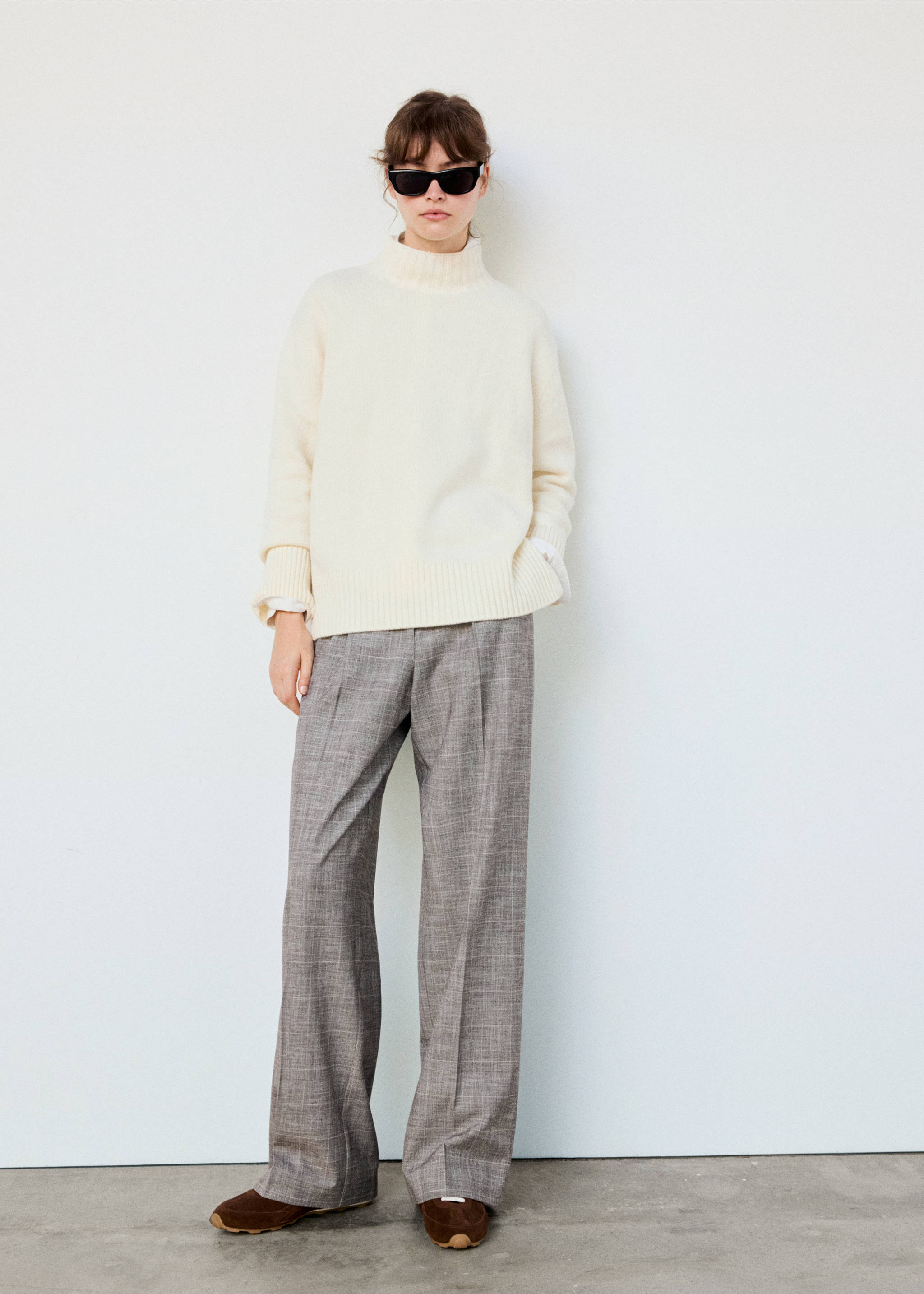 Grey patterned straight trousers worn with a cream turtleneck sweater., Brown. Ref: 37077136-01.