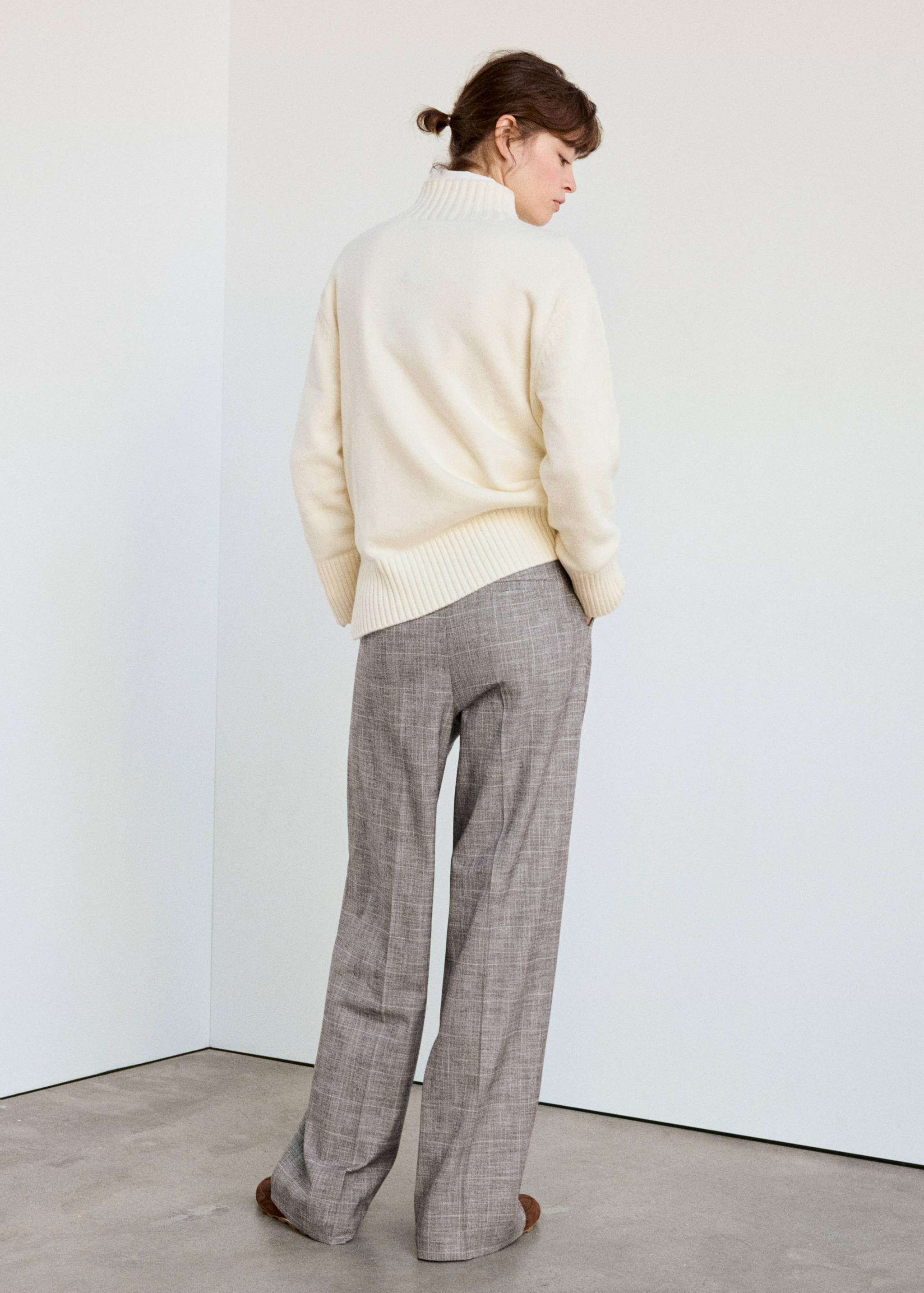 Grey patterned trousers in a straight fit, shown from the back view.
