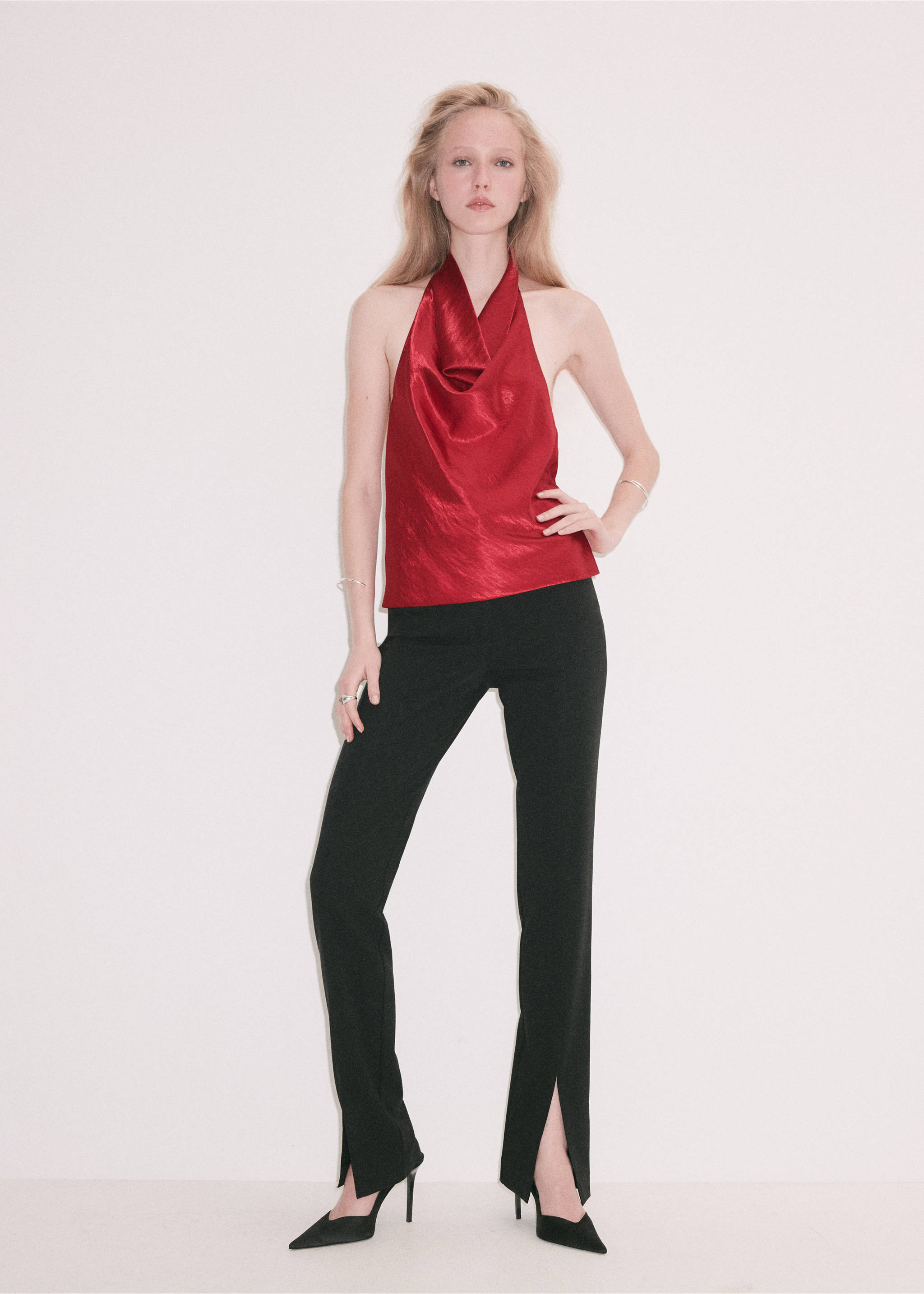 Red halter neck top with a draped cowl neckline, worn with black trousers., Red. Ref: 37077780-00.