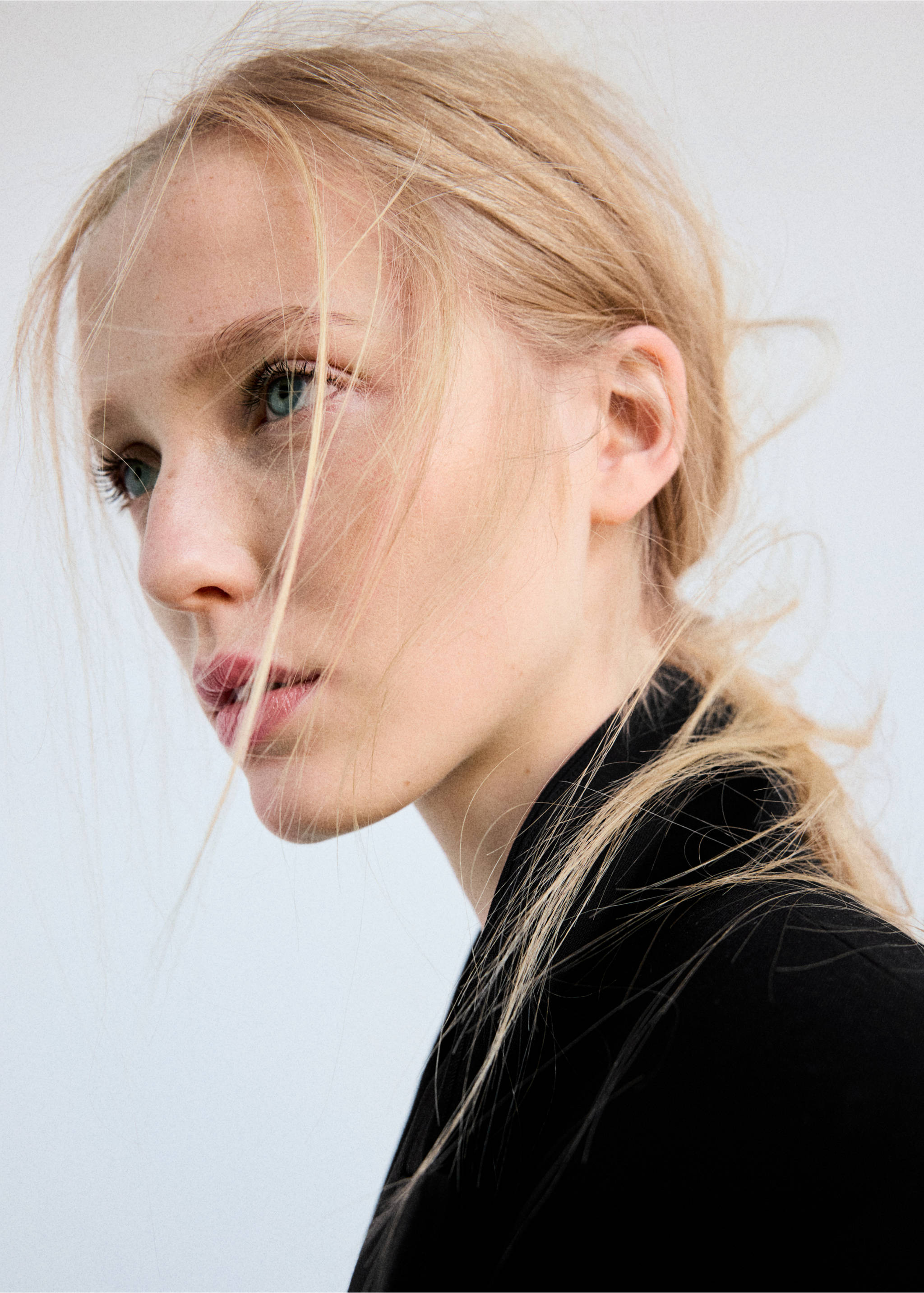 Close-up of a model wearing a black dress., Black. Ref: 37077784-00.