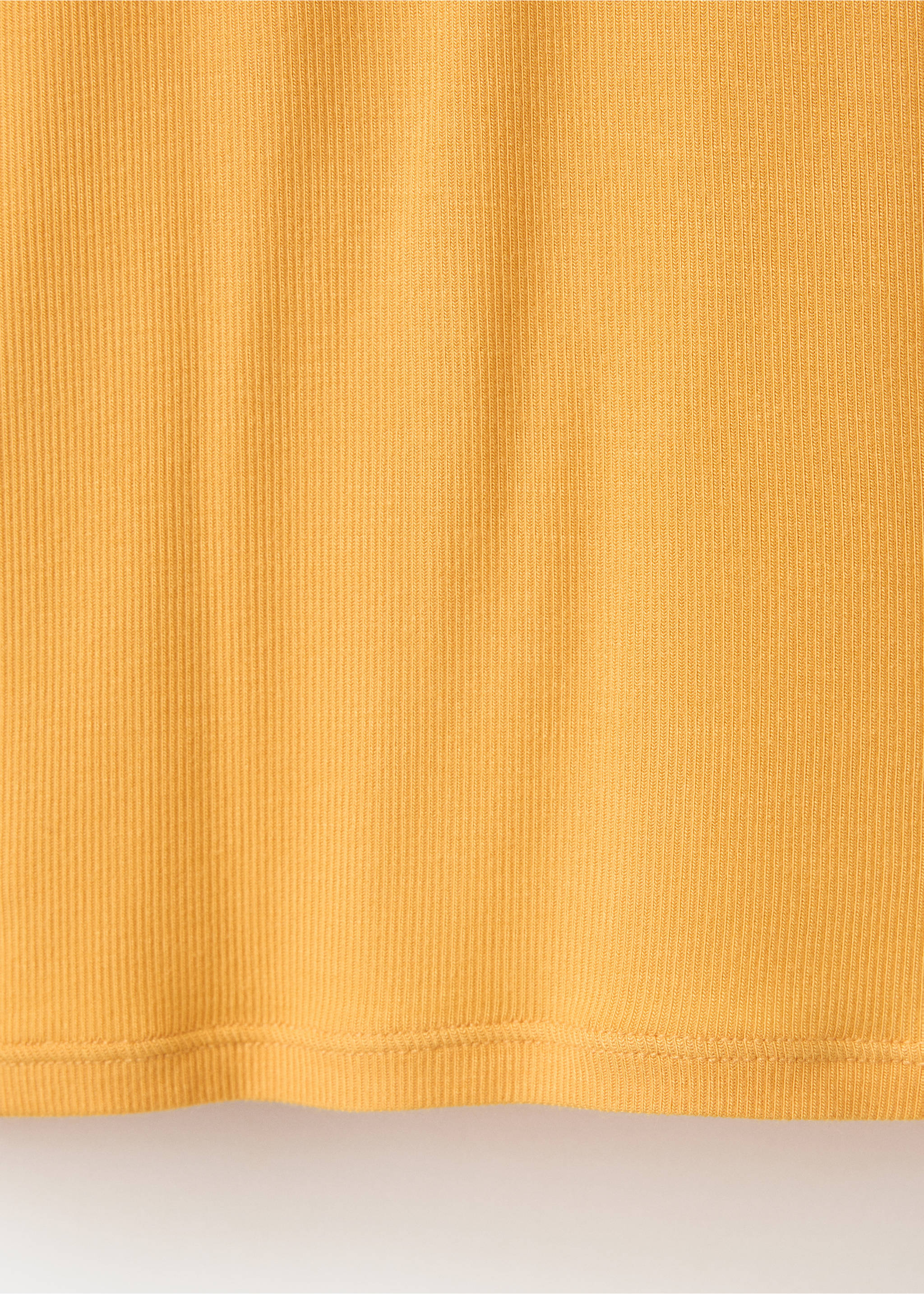 Yellow t-shirt fabric detail featuring a fine ribbed knit texture., Mustard. Ref: 37077792-00.