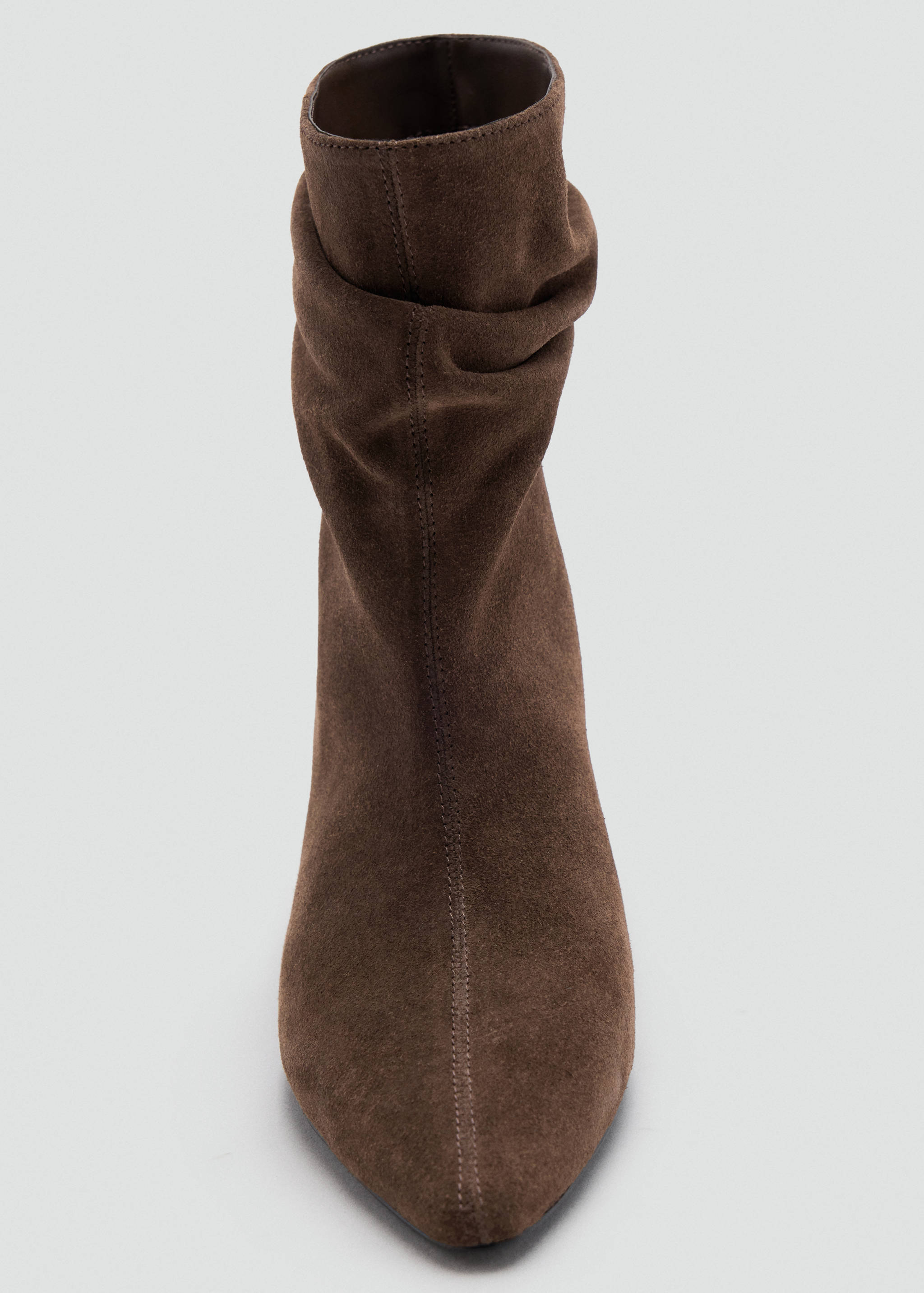 Brown suede ankle boot with a pointed toe and slouchy shaft.