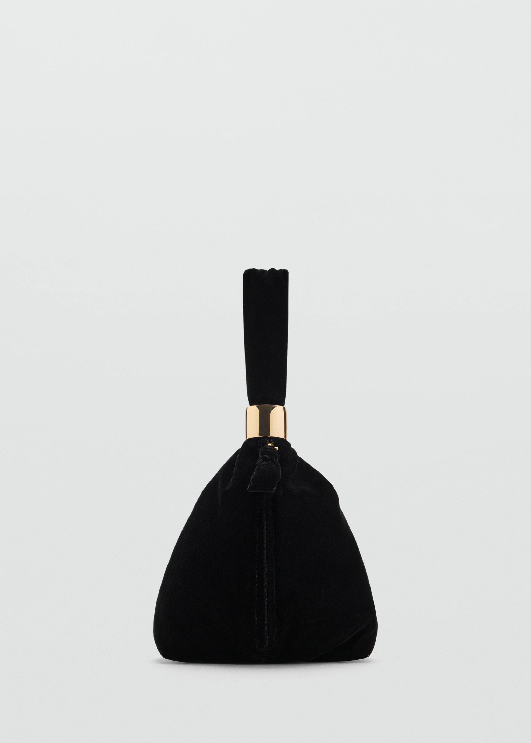 Black velvet handbag with a soft gathered design and a polished gold-tone metal ring handle.