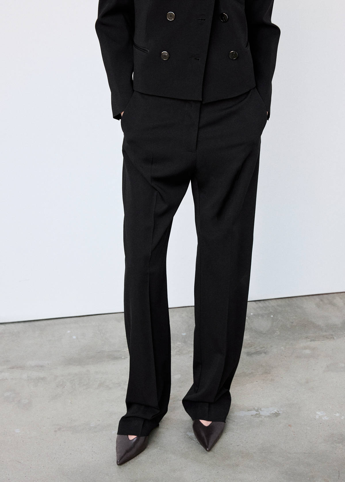 Straight-leg trousers with pressed crease — Black