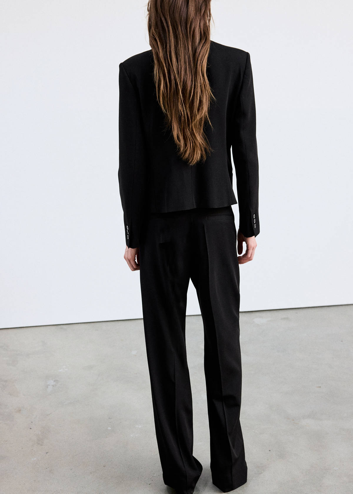 Straight-leg trousers with pressed crease — Black