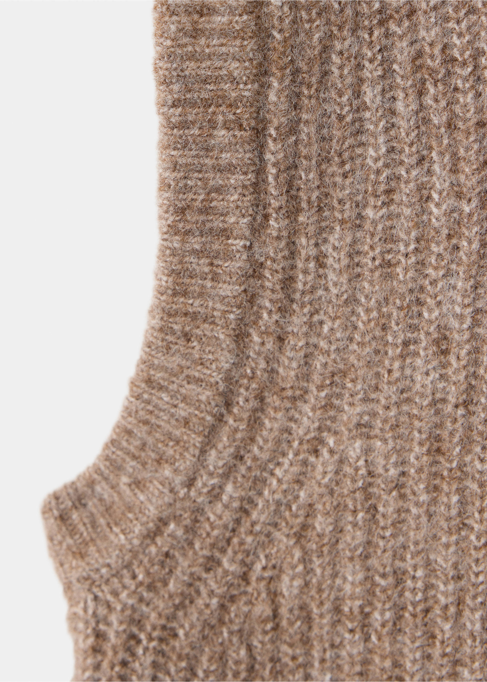 Brown knit vest fabric close-up showing texture and armhole detail., Medium Brown. Ref: 37077809-00.