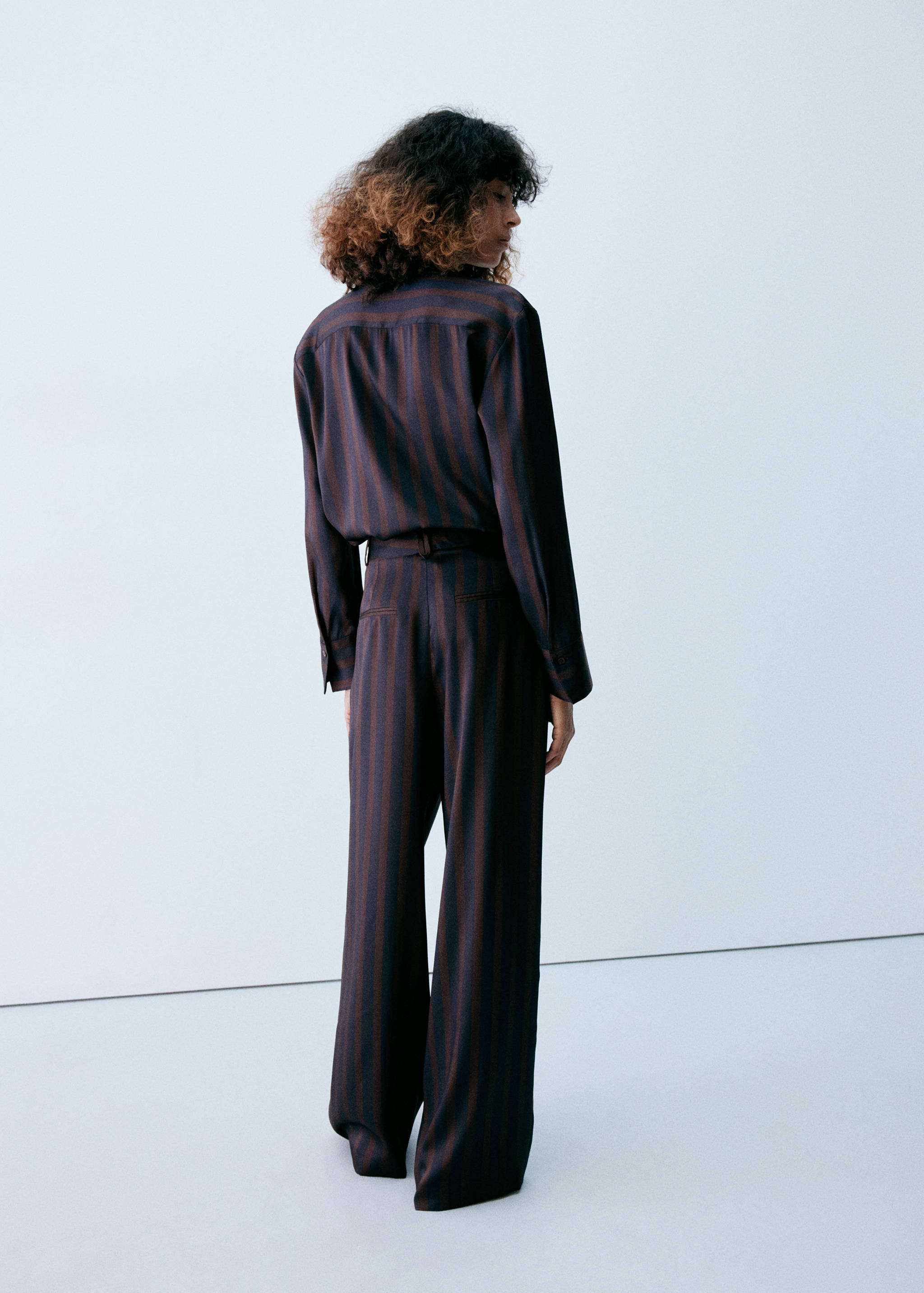 Pleated striped trousers - Reverse of the article