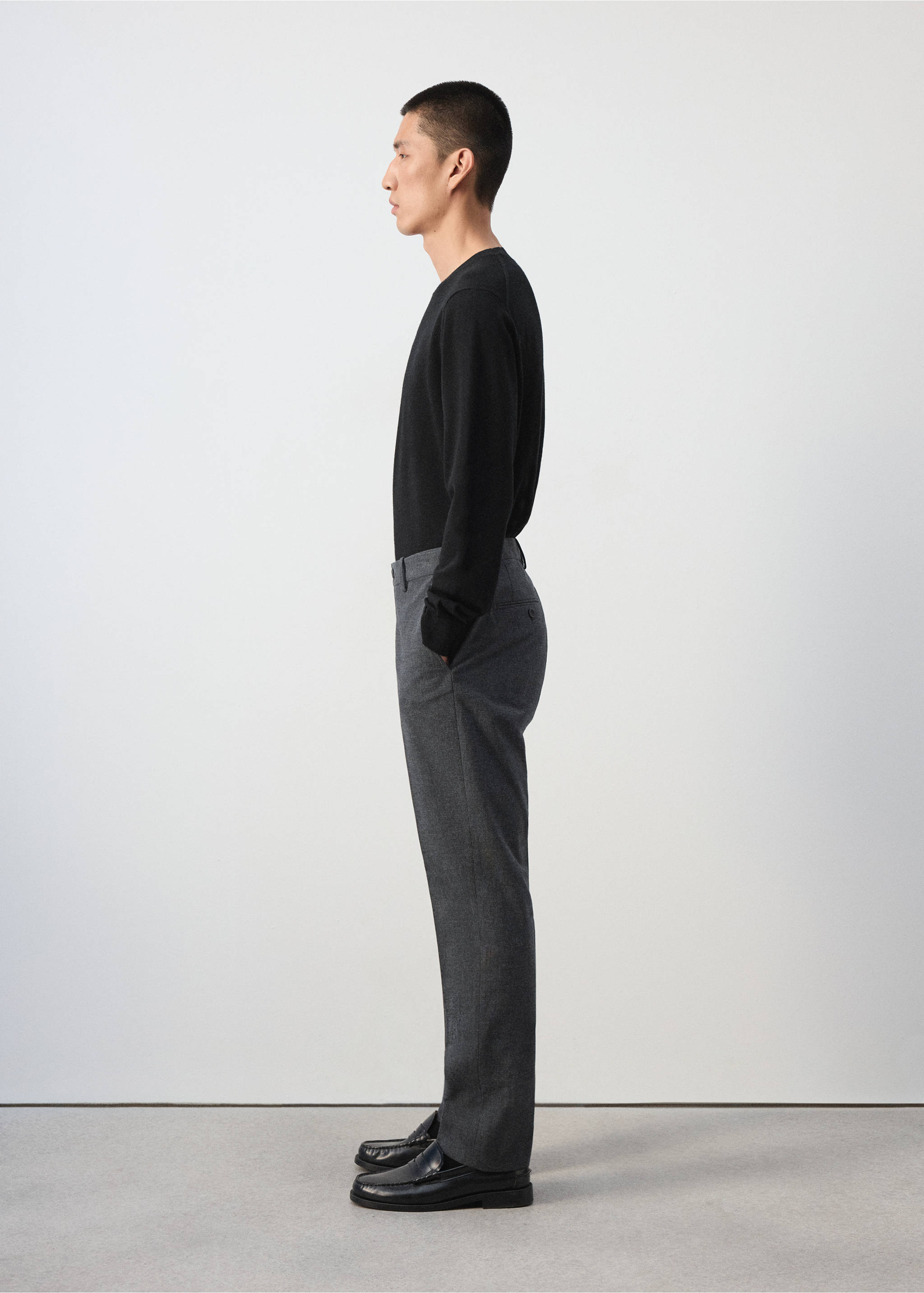Dark grey trousers with a tailored straight-leg fit, shown in profile., Dark Heather Grey. Ref: 37077883-00.