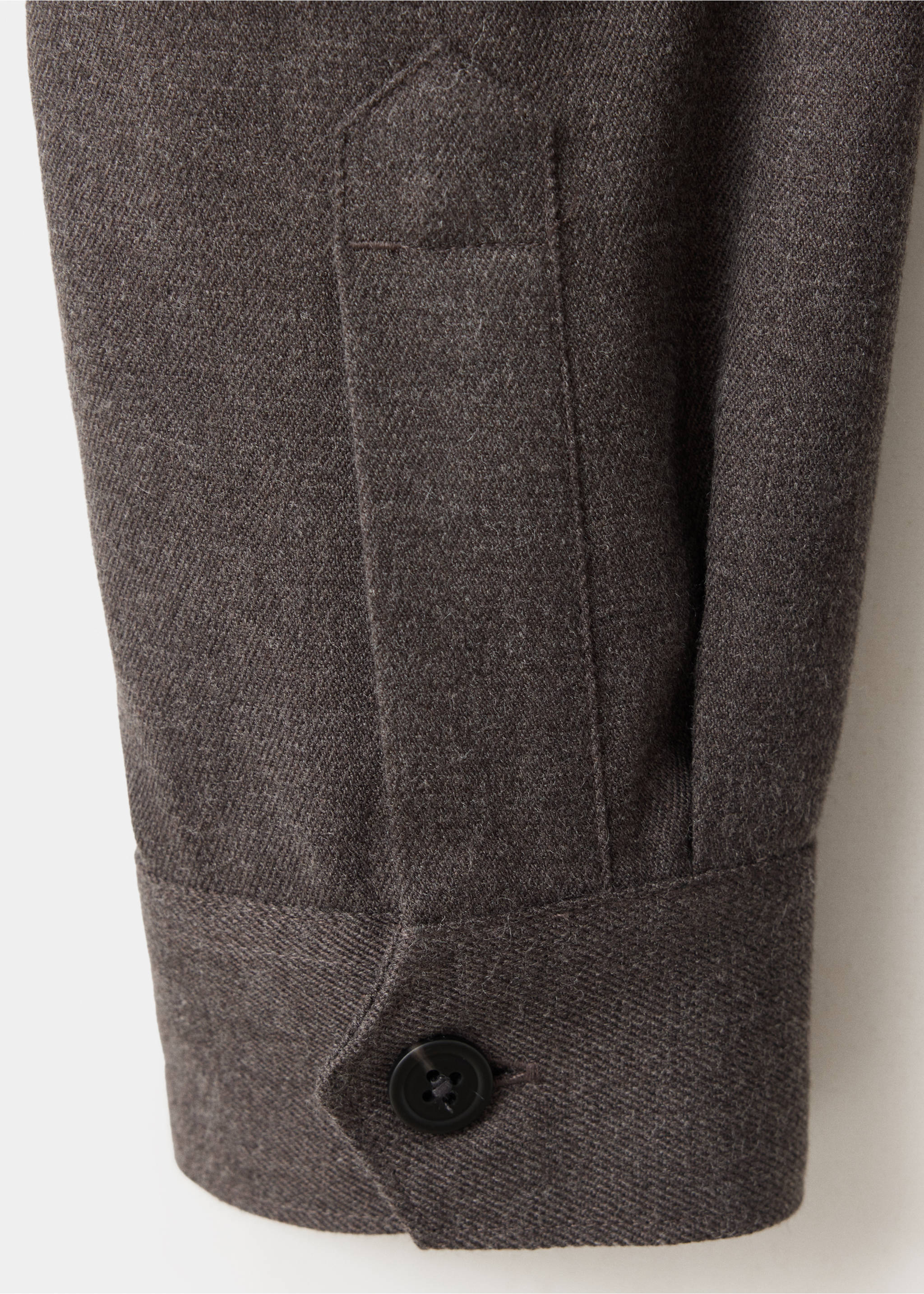 Close-up of a brown overshirt sleeve showing the textured fabric and buttoned cuff., Brown. Ref: 37077884-00.