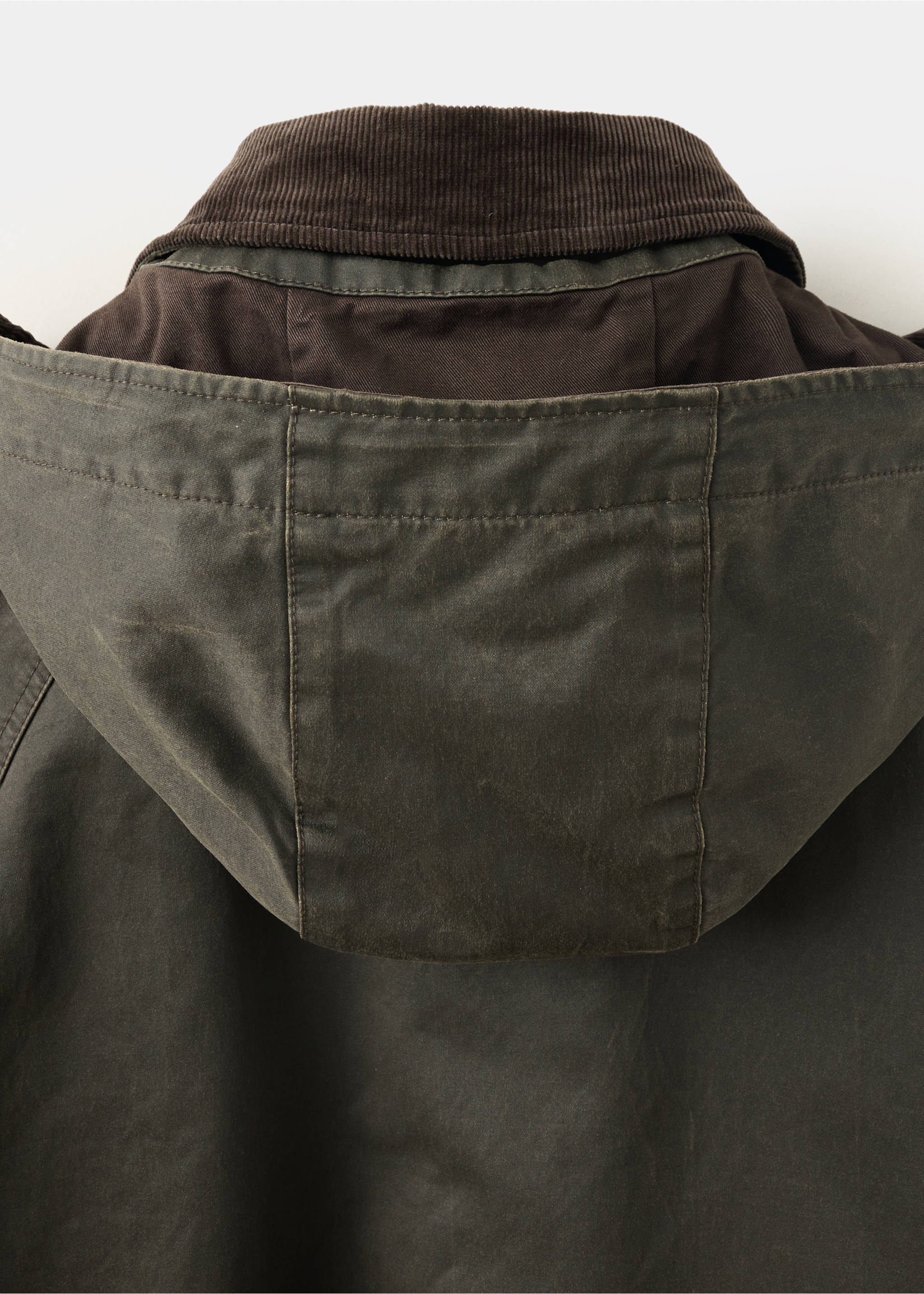 Olive green parka fabric detail showing the hood and brown corduroy collar., Dark Green. Ref: 37077887-00.