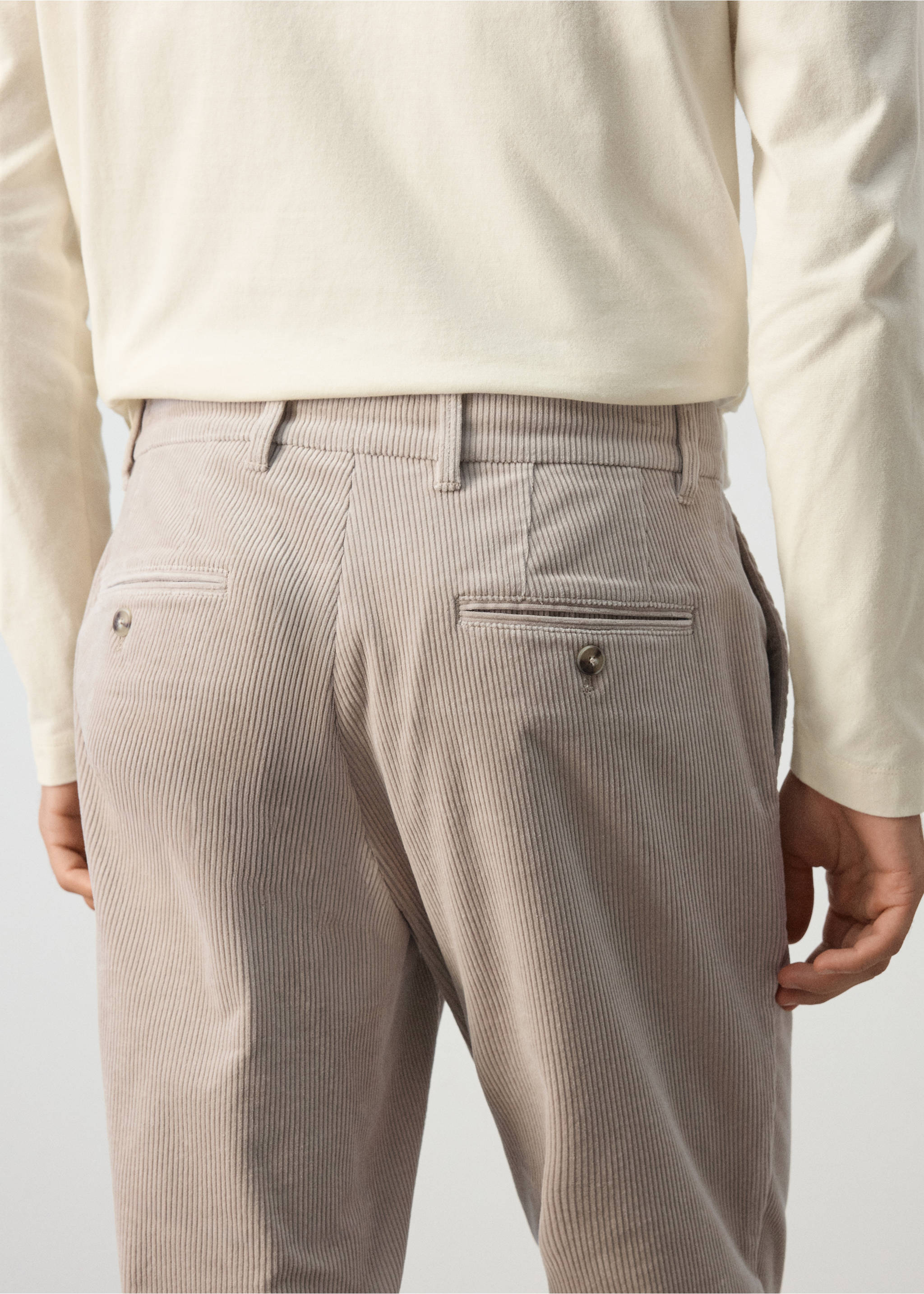 Light grey corduroy trousers seen from the back, featuring belt loops., Light/Pastel Grey. Ref: 37077898-00.