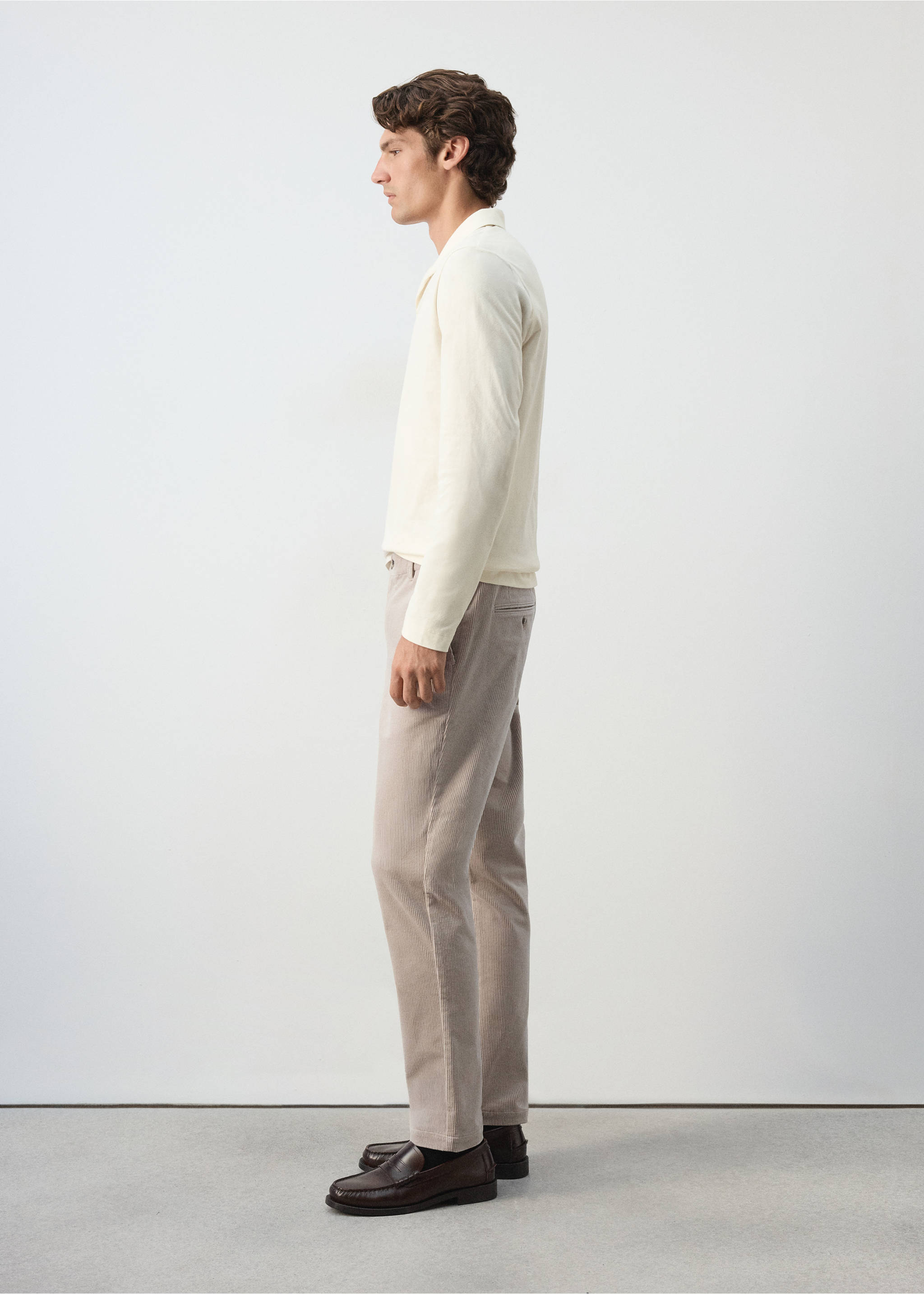 Beige trousers with a straight-leg fit, shown in profile on a model., Light/Pastel Grey. Ref: 37077898-00.