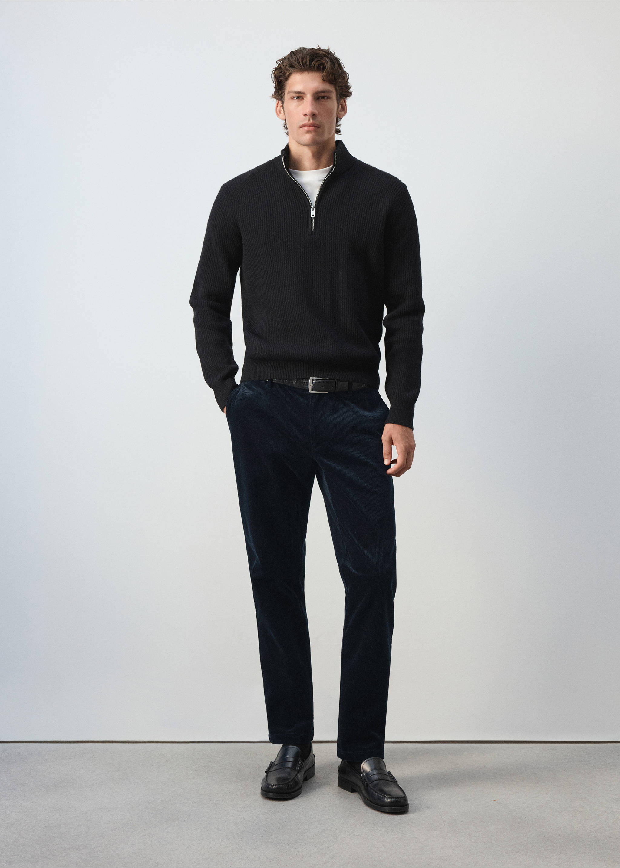 Dark blue trousers with a straight silhouette, worn with a dark zip-neck sweater., Navy. Ref: 37077898-00.