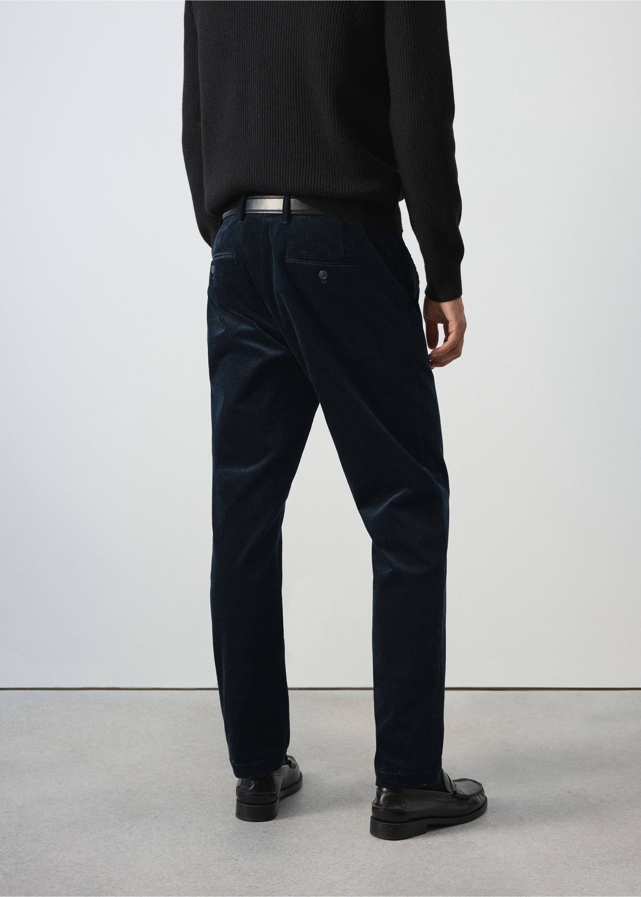 Navy blue corduroy trousers seen from the back on a model., Navy. Ref: 37077898-00.