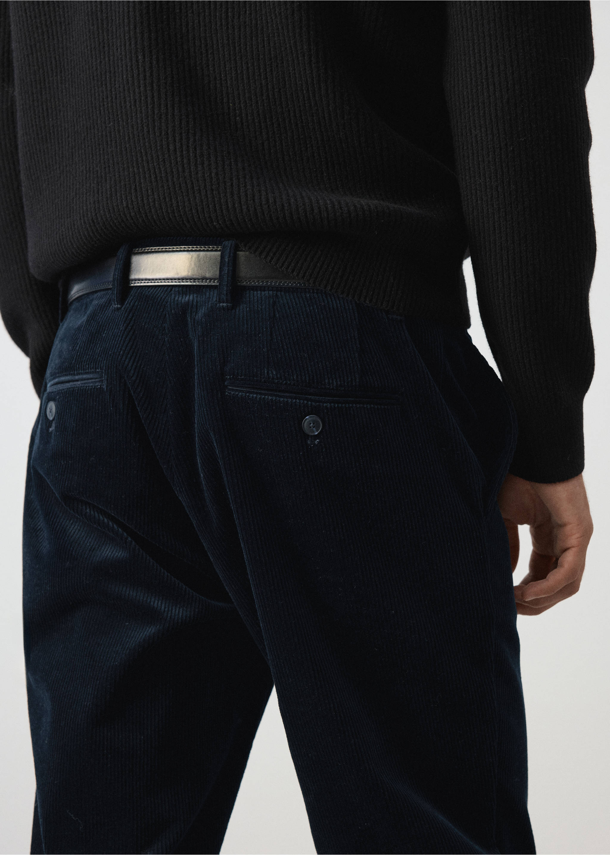 Dark blue corduroy trousers with back welt pockets and a thin black belt., Navy. Ref: 37077898-00.