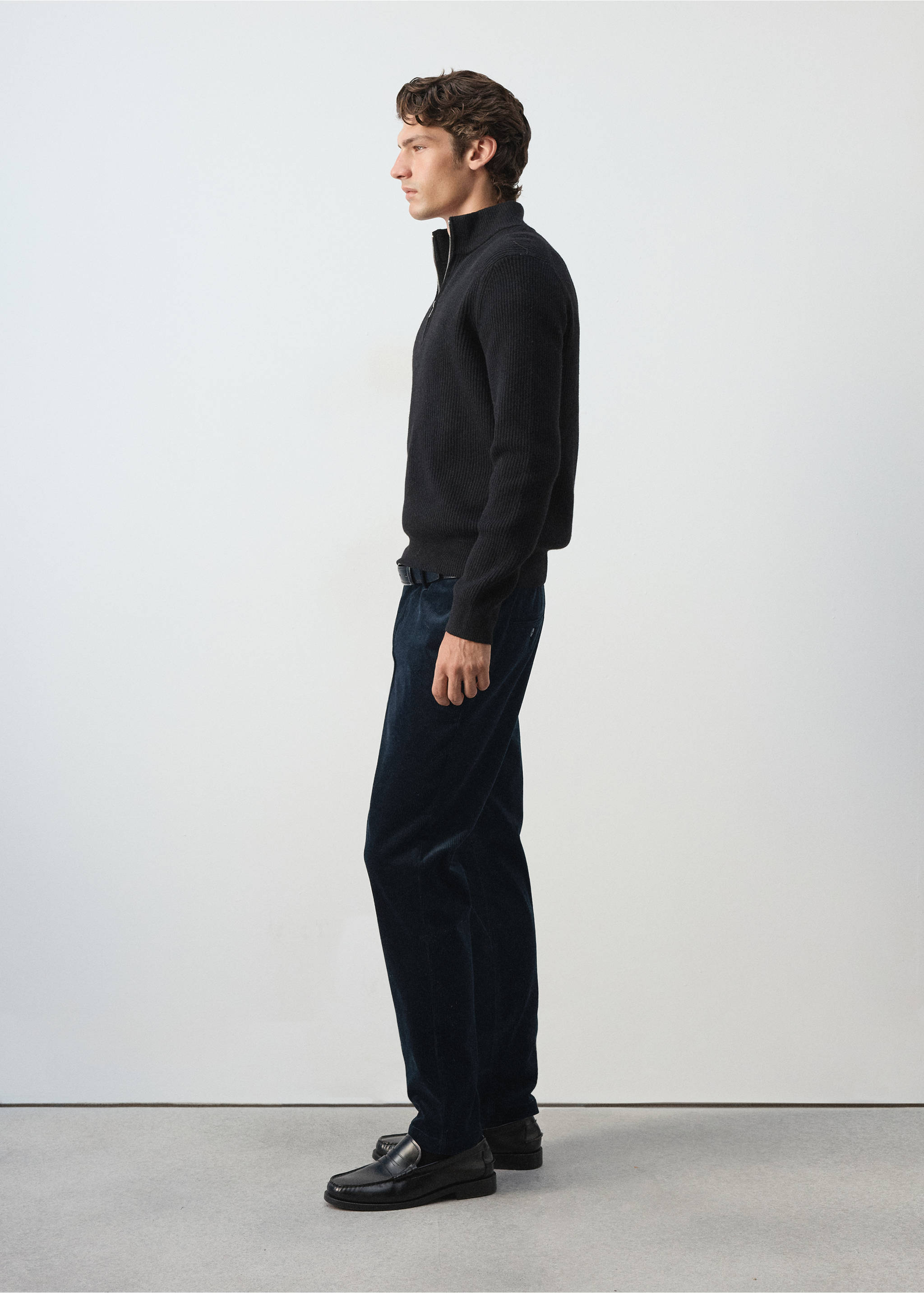 Navy blue corduroy trousers with a straight leg, worn with a black zip-neck jumper., Navy. Ref: 37077898-00.