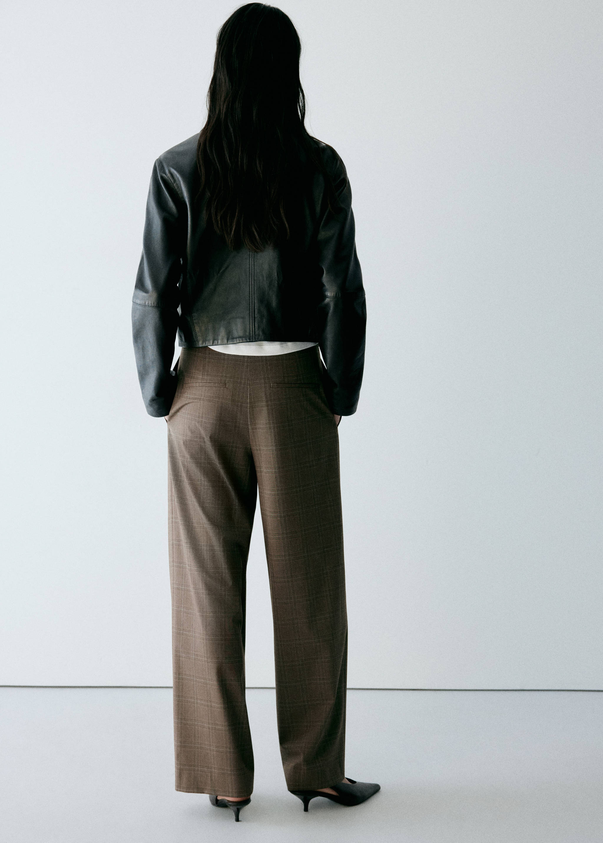 Brown checked trousers, back view