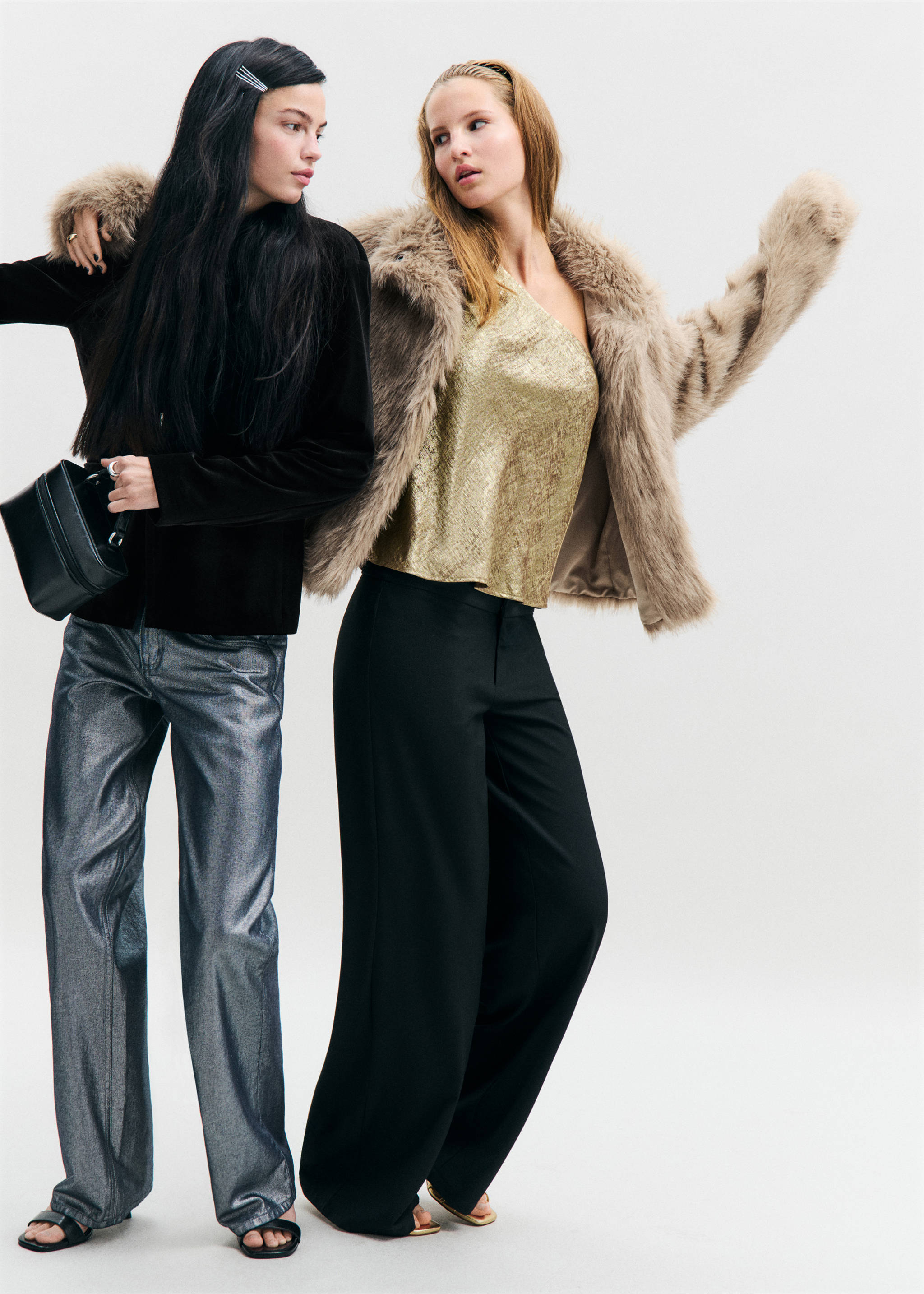 Beige faux-fur coat worn with a gold one-shoulder top and black trousers., Beige. Ref: 37077905-00.