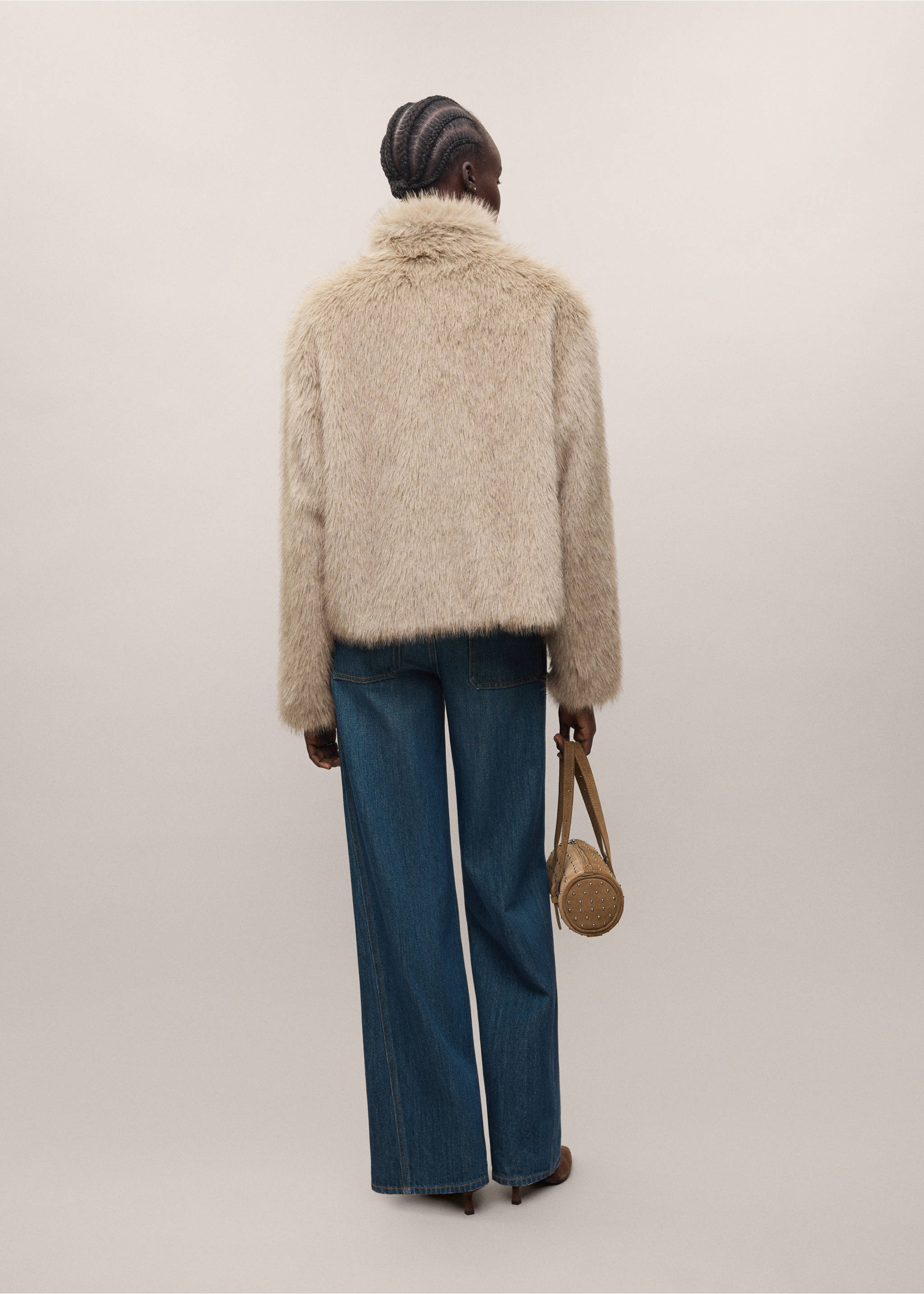 Beige faux-fur coat seen from the back, paired with blue denim trousers., Beige. Ref: 37077905-01.