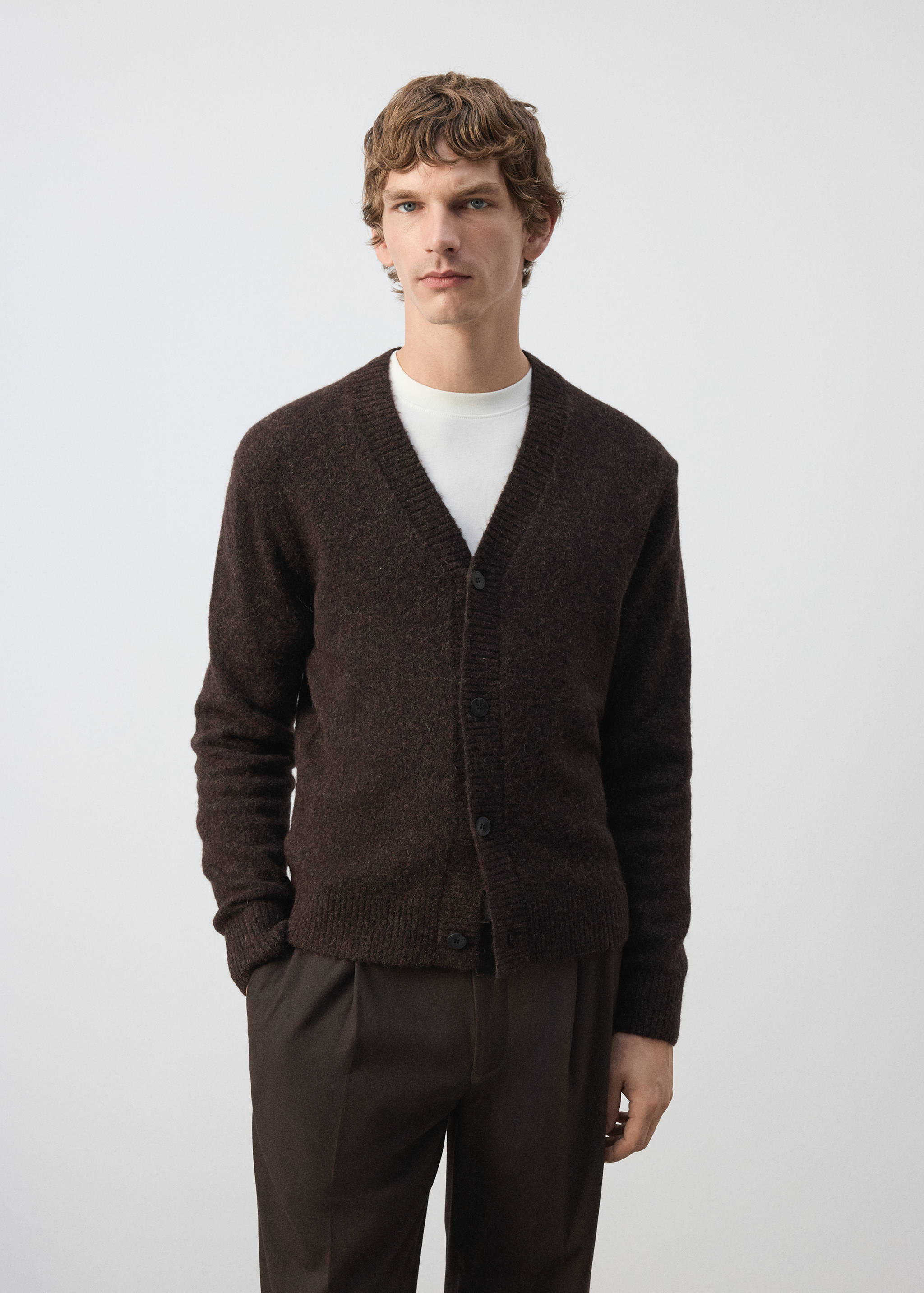 Dark brown knitted V-neck cardigan with front buttons.