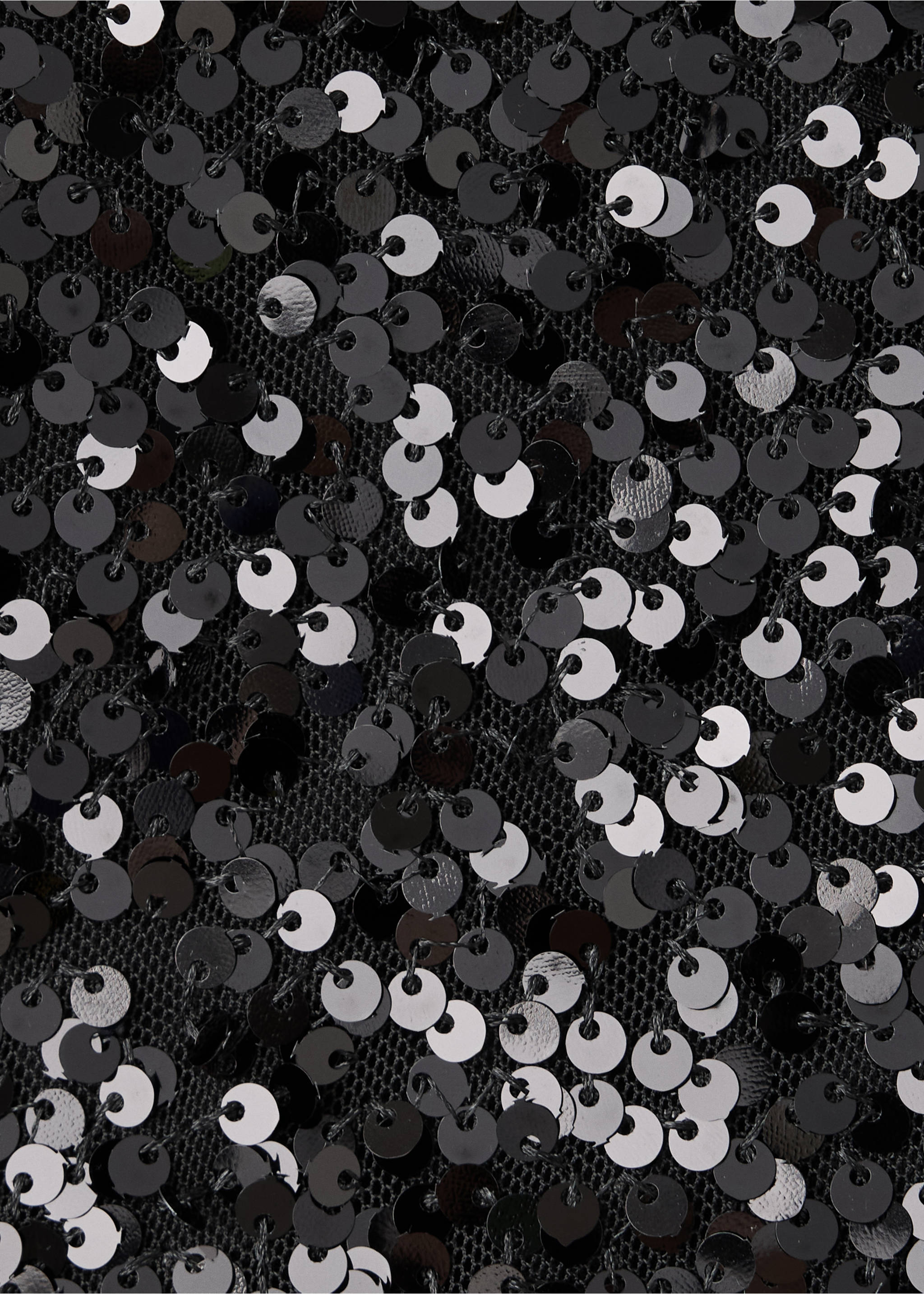 Close-up of black sequin fabric texture on the shorts., Black. Ref: 37077929-00.