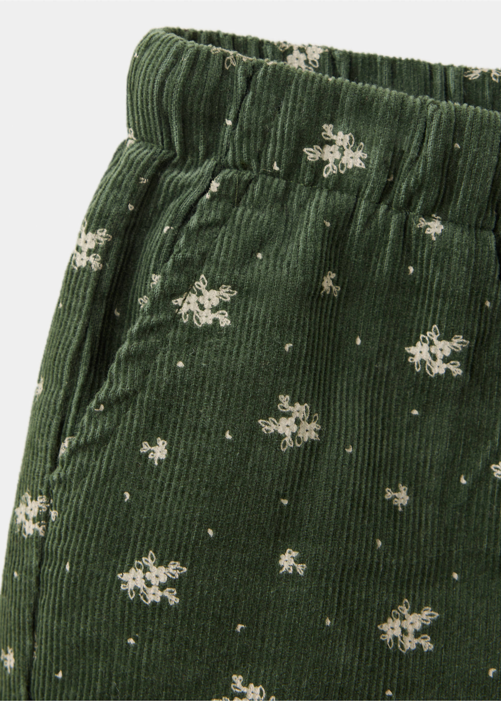 Dark green corduroy trousers with white floral print and elasticated waist., Khaki. Ref: 37077934-00.