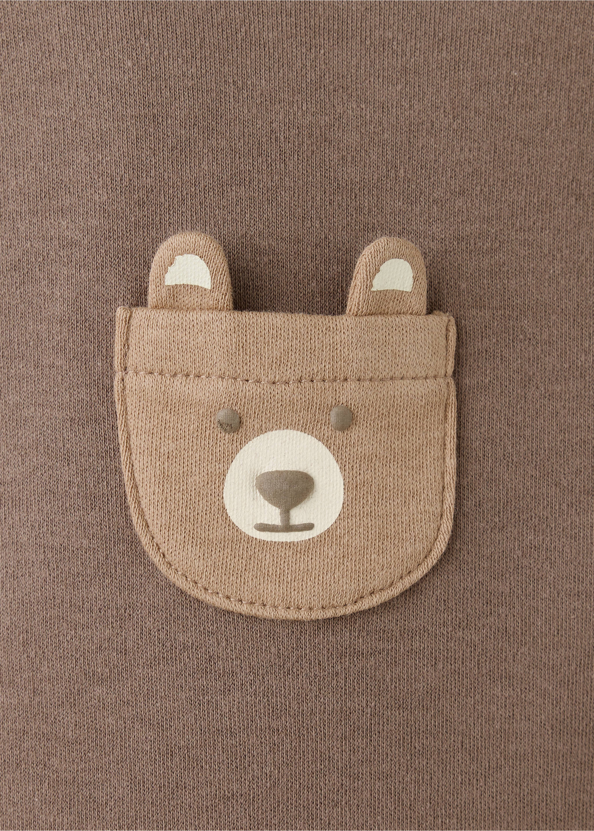 Brown baby body featuring a cute bear-face patch pocket with small ears., Chocolate. Ref: 37077936-00.