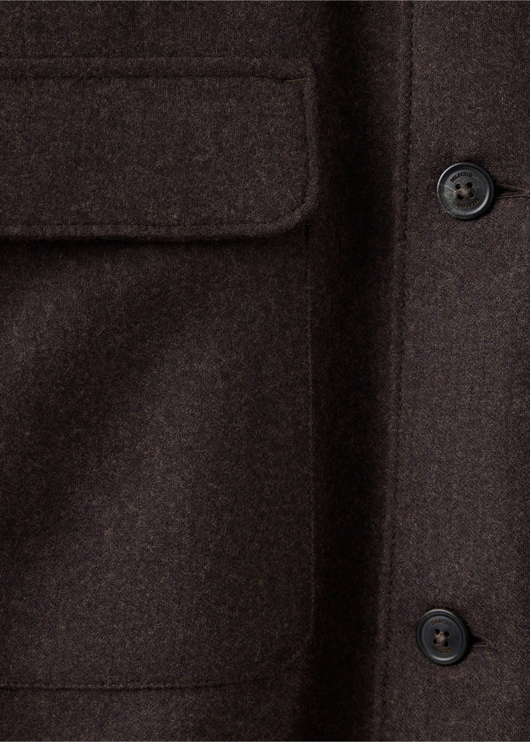 Close-up of a dark brown overshirt fabric and pocket detail., Chocolate. Ref: 37077938-00.