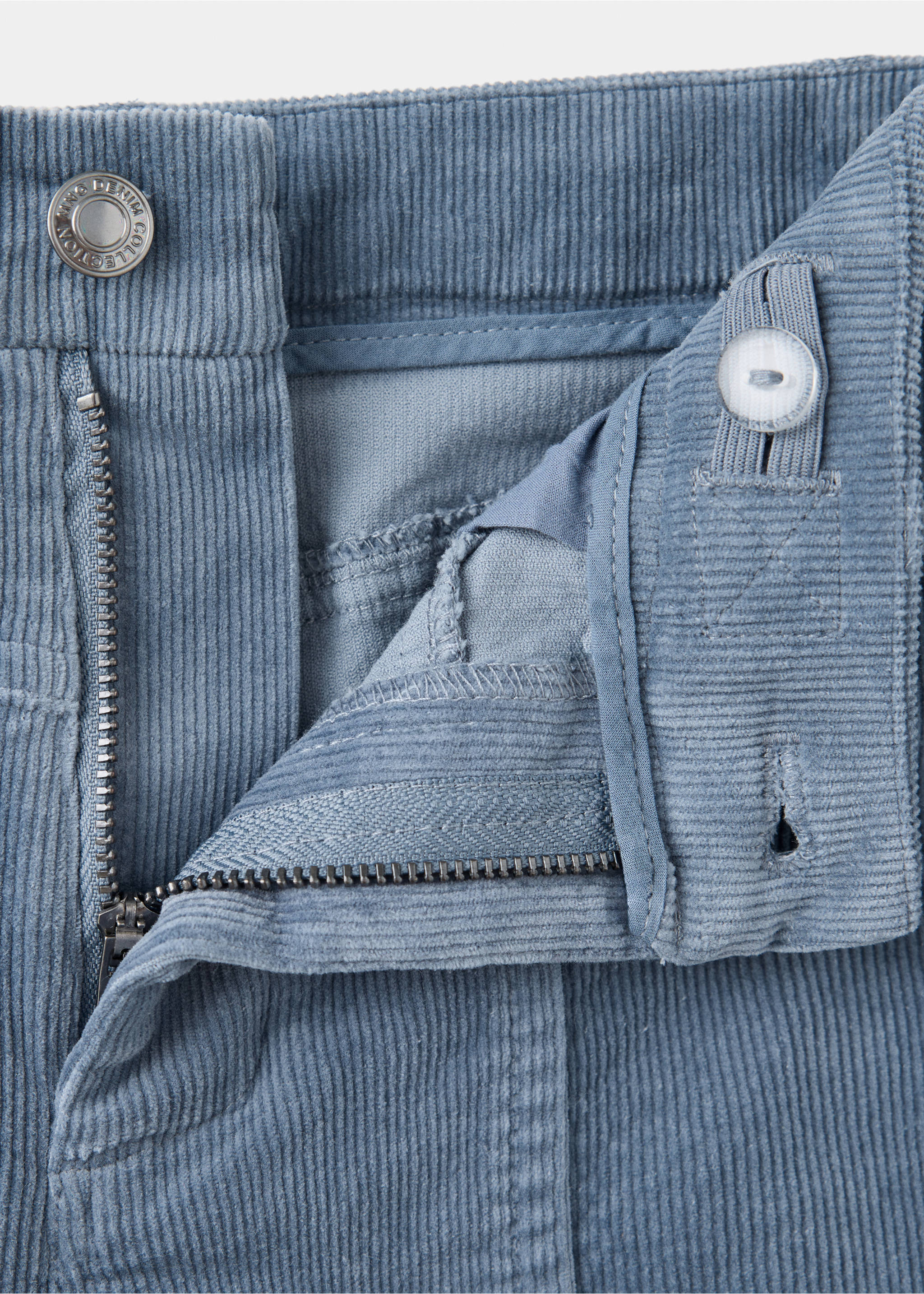 Blue corduroy trousers waist detail featuring a zip fly and button., Blue. Ref: 37078270-00.