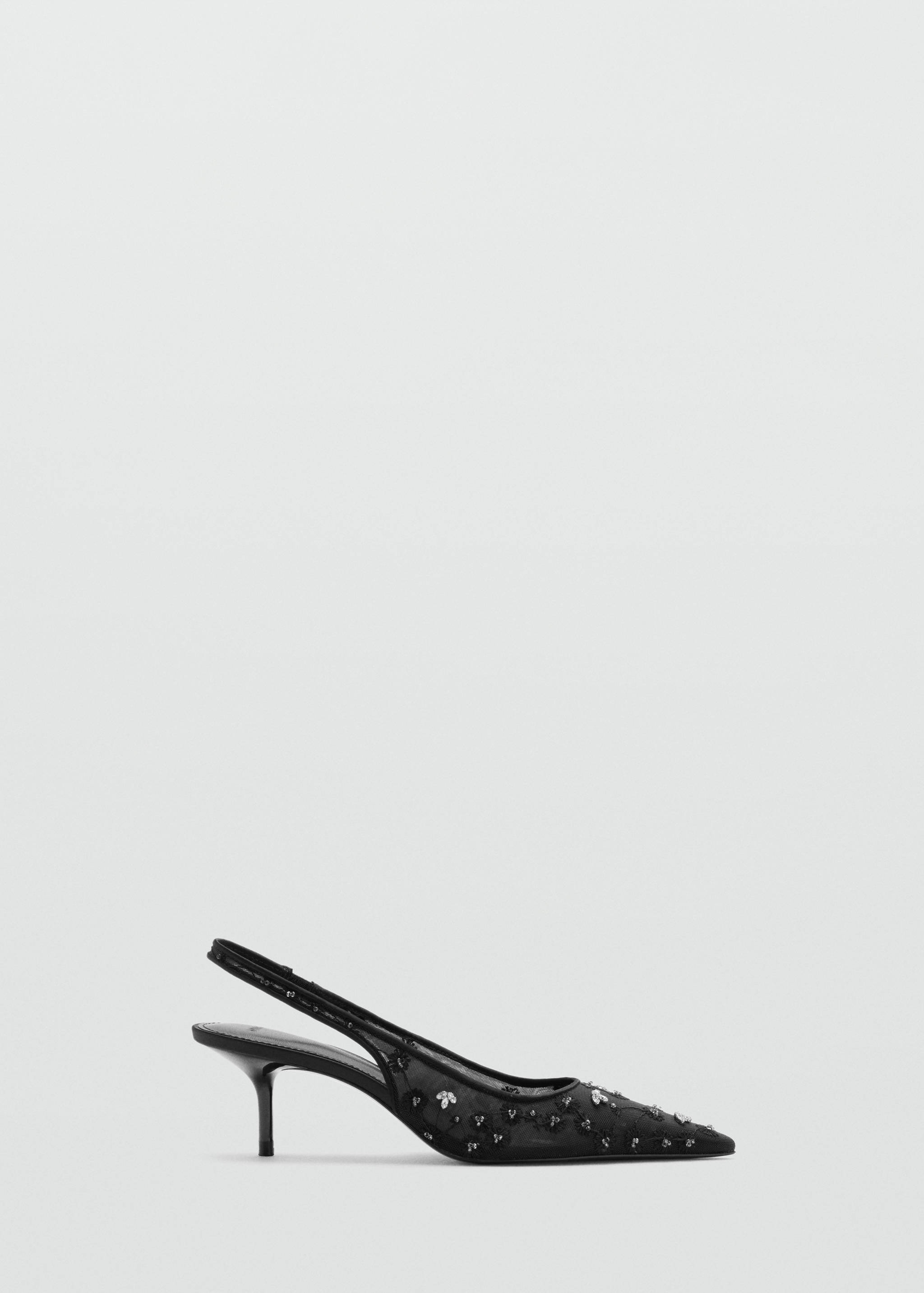 Black embellished mesh slingback shoes with a kitten heel.