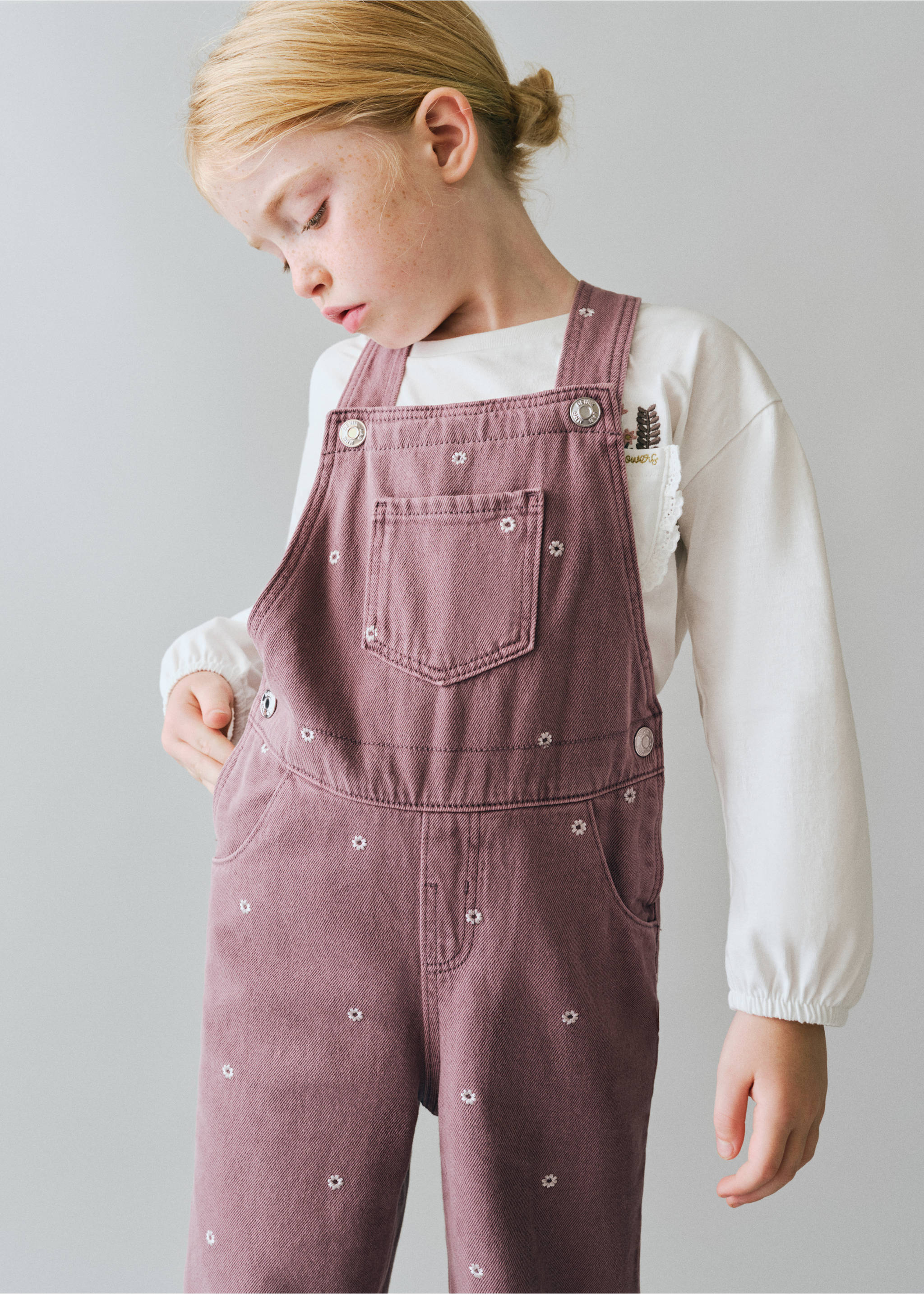Mauve denim dungarees with white daisy embroidery over a white top., Lilac. Ref: 37078285-00.