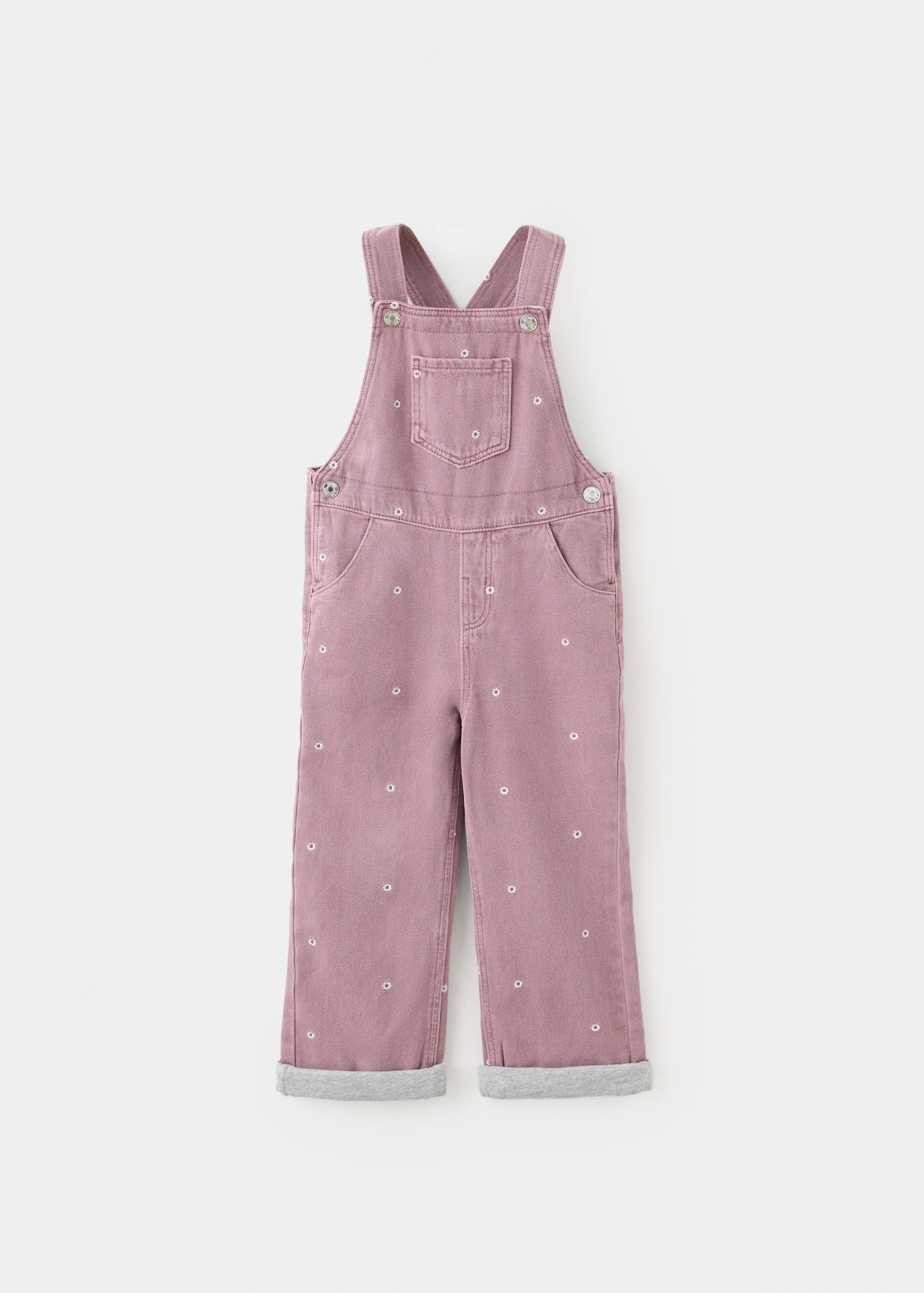 Mauve floral embroidered denim dungarees with rolled-up cuffs.