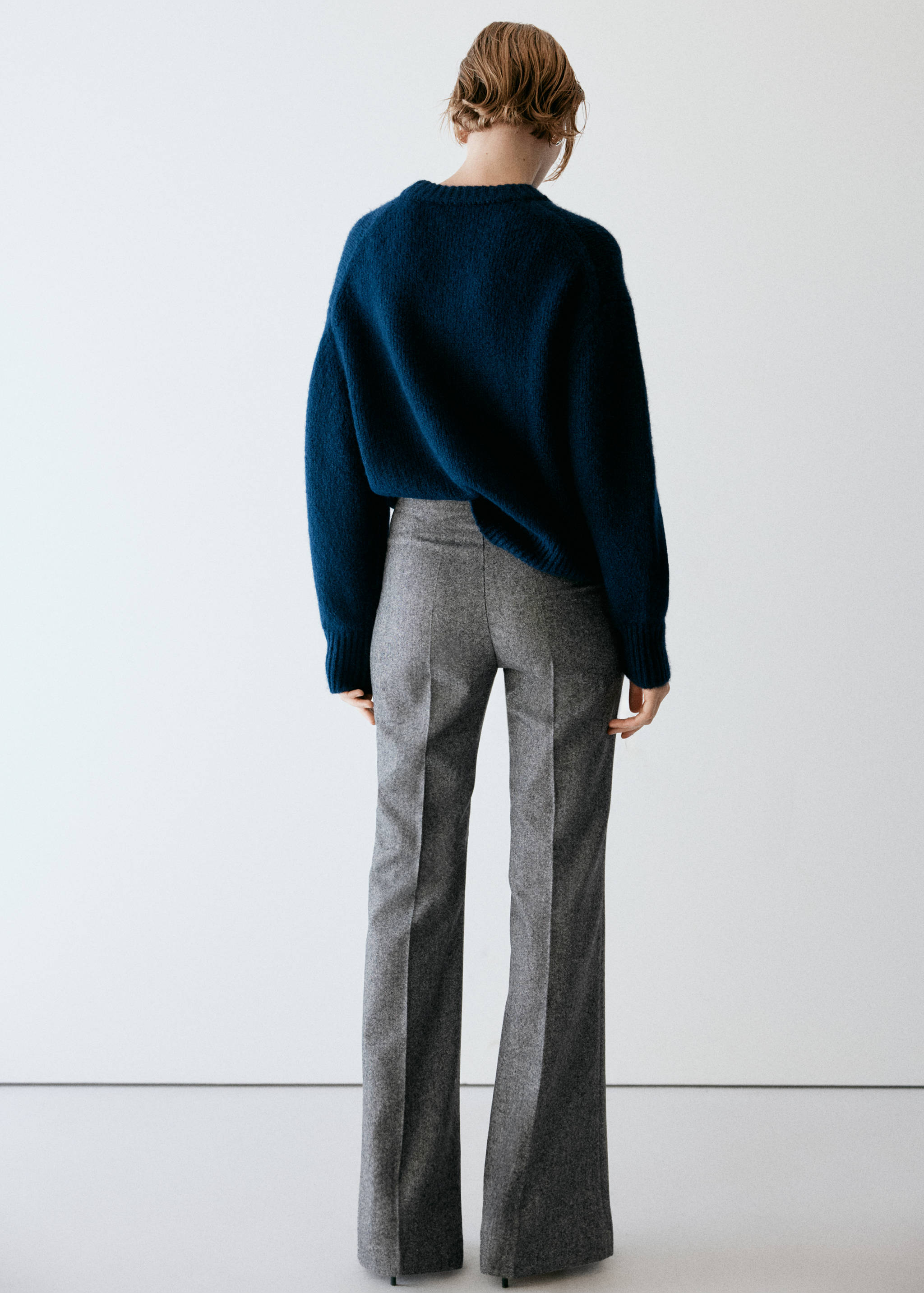 Grey patterned trousers from the back, worn with a dark blue sweater., Medium Heather Grey. Ref: 37078287-00.