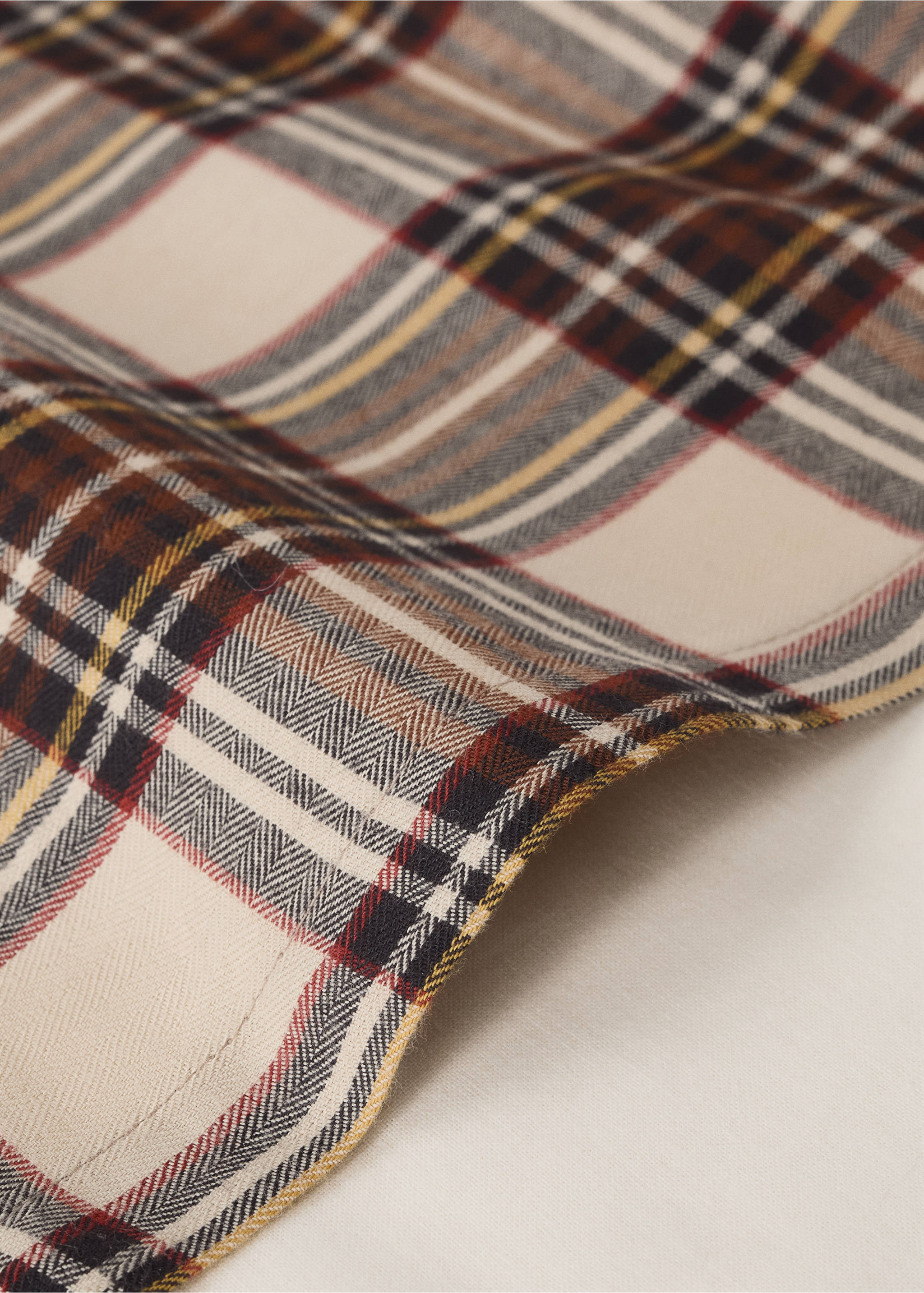 Close-up of a cream and multi-coloured check cot duvet cover showing fabric texture., Red. Ref: 37078638-00.