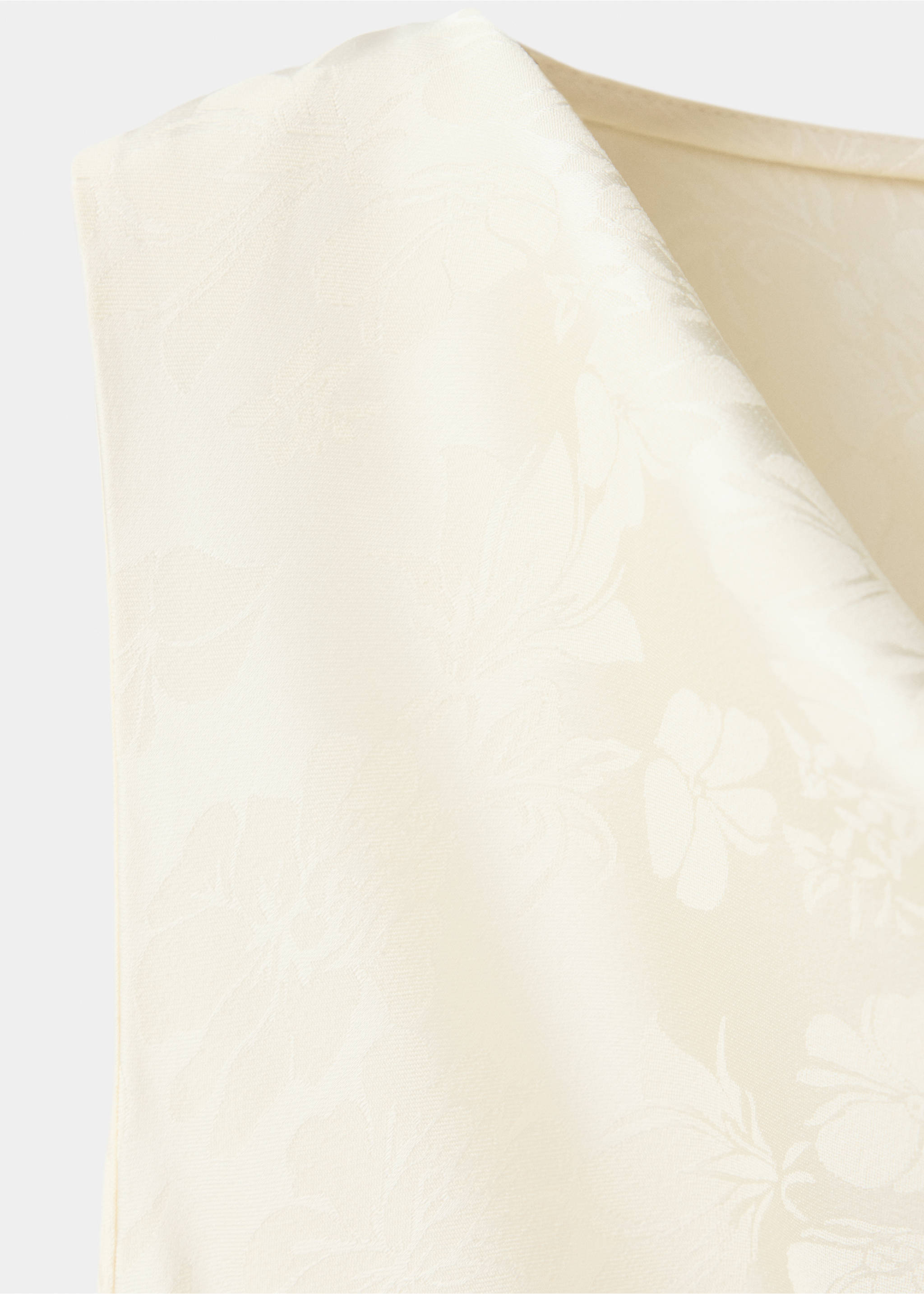 Close-up of a cream top with a tonal floral jacquard fabric and cowl neck., Ecru. Ref: 37079117-00.