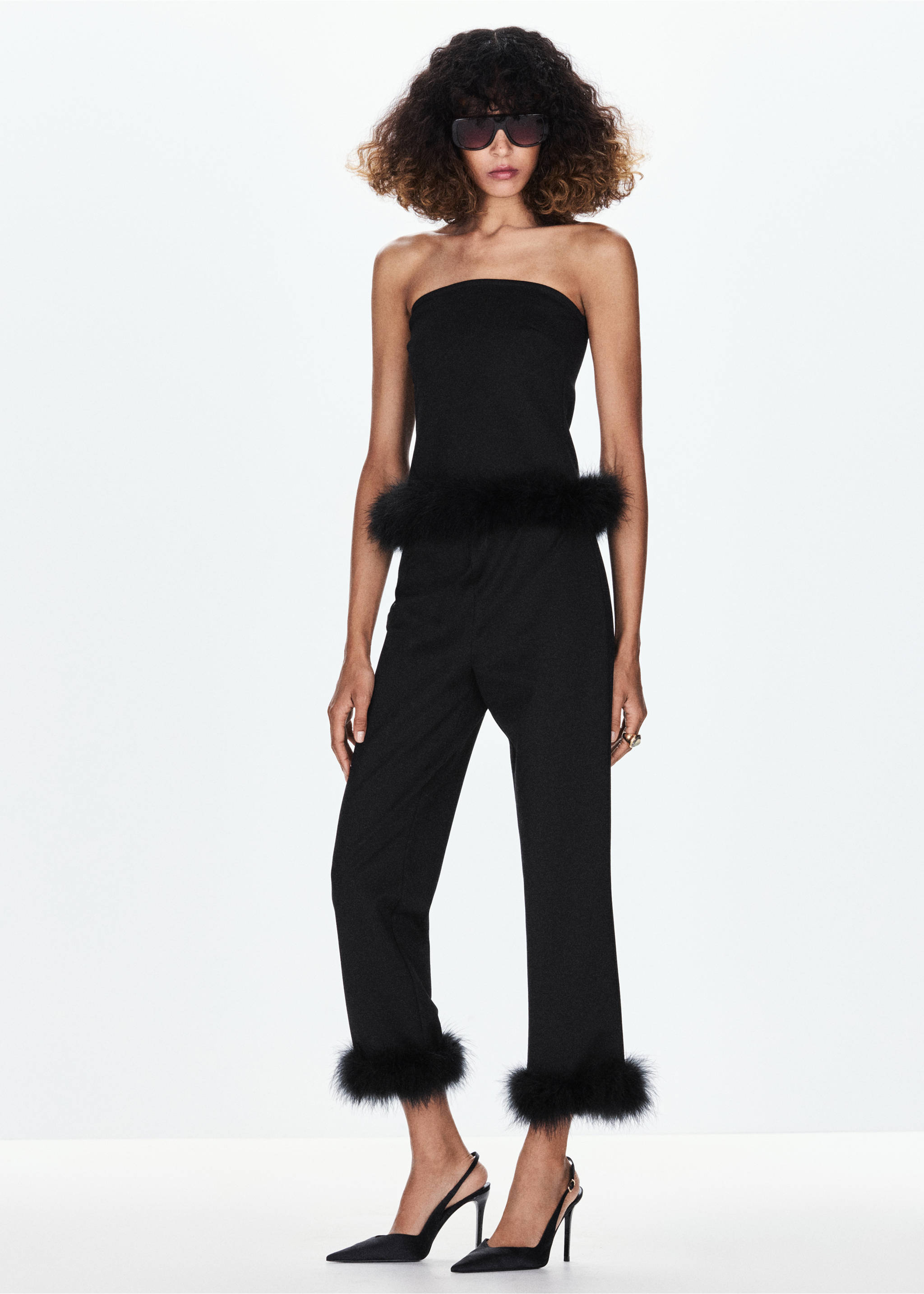 Black trousers with faux-fur cuffs, worn with a matching strapless top., Black. Ref: 37079123-00.