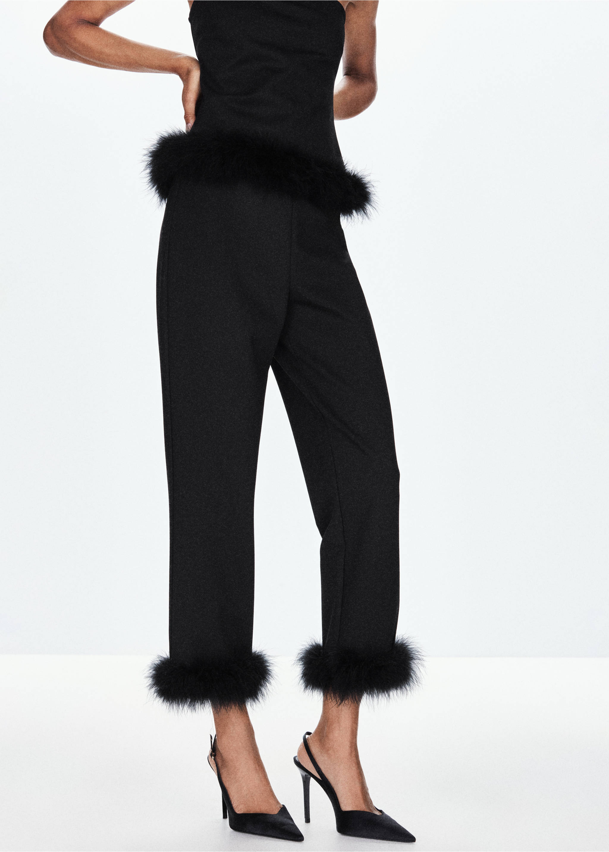 Black straight-leg trousers with fluffy faux-feather trim at the hems., Black. Ref: 37079123-00.