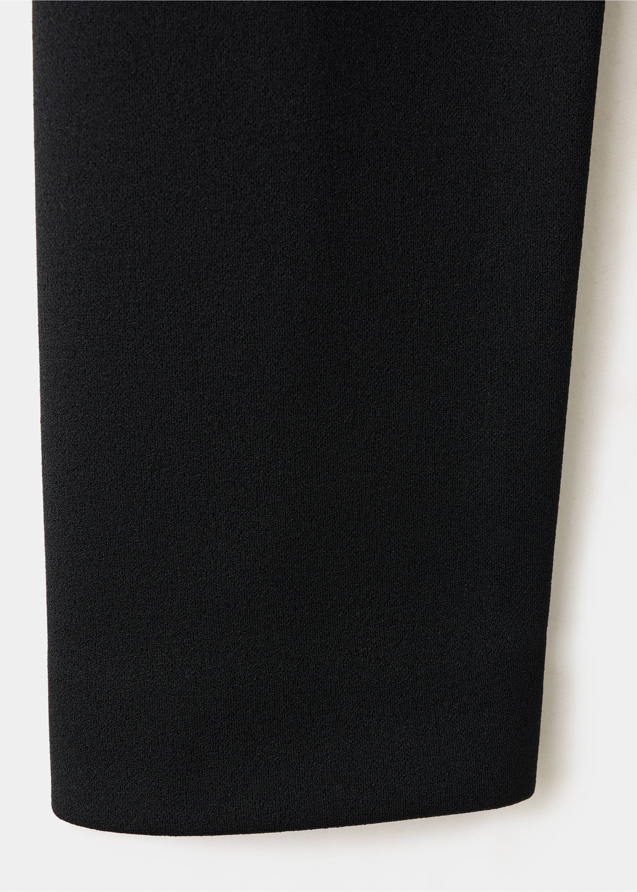 Close-up of the black fabric detail of a jacket., Black. Ref: 37079124-00.