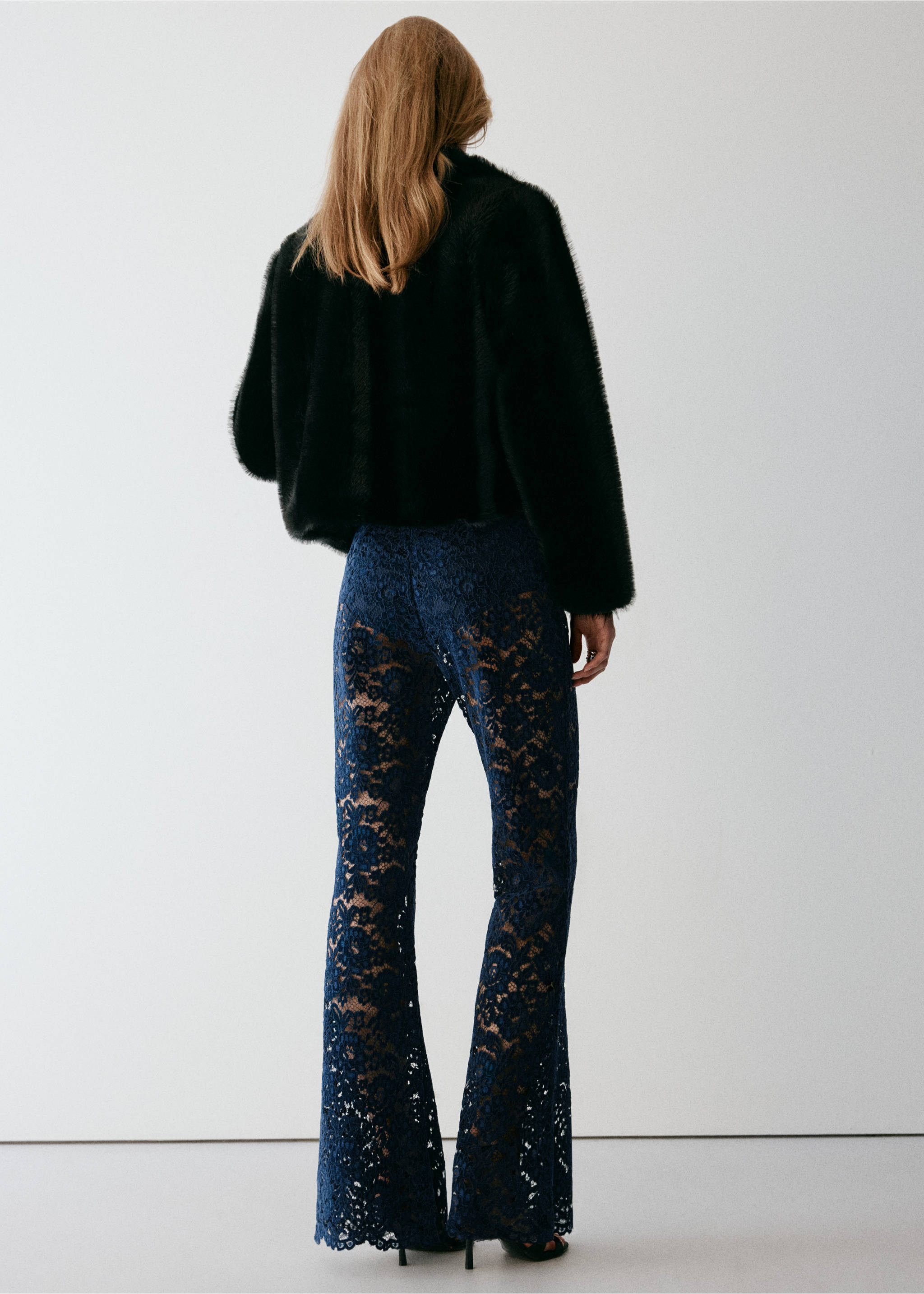 Back view of dark blue lace trousers with a fitted and flared silhouette., Navy. Ref: 37079132-00.