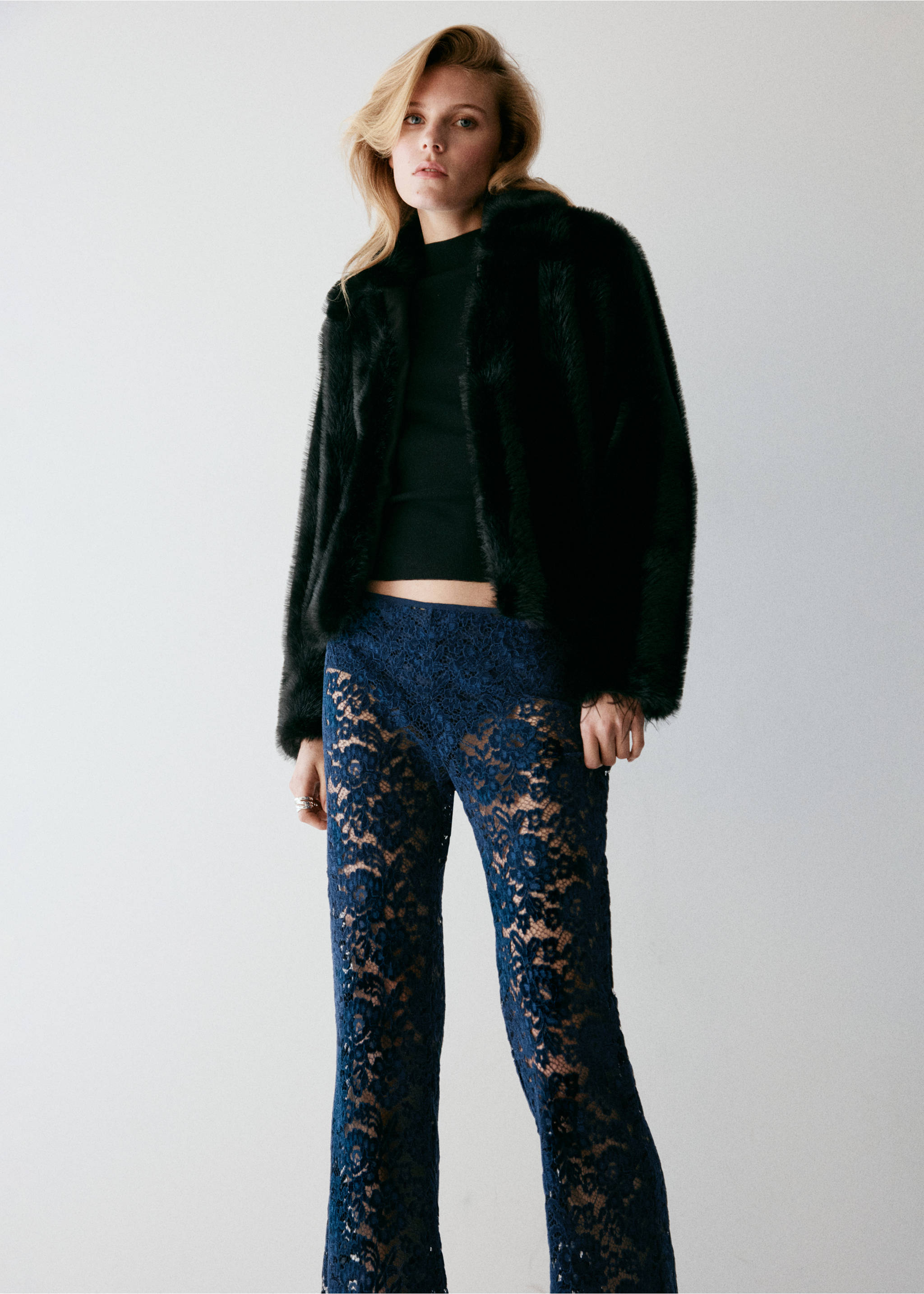 Dark blue lace trousers worn with a black top and faux-fur jacket., Navy. Ref: 37079132-00.