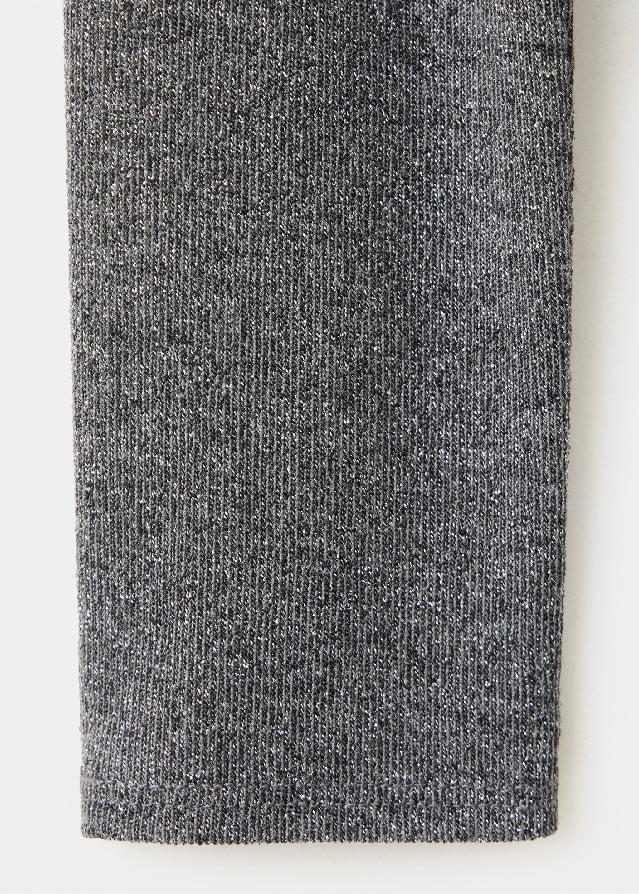 Close-up of a grey metallic ribbed knit blouse sleeve., Grey. Ref: 37079133-00.