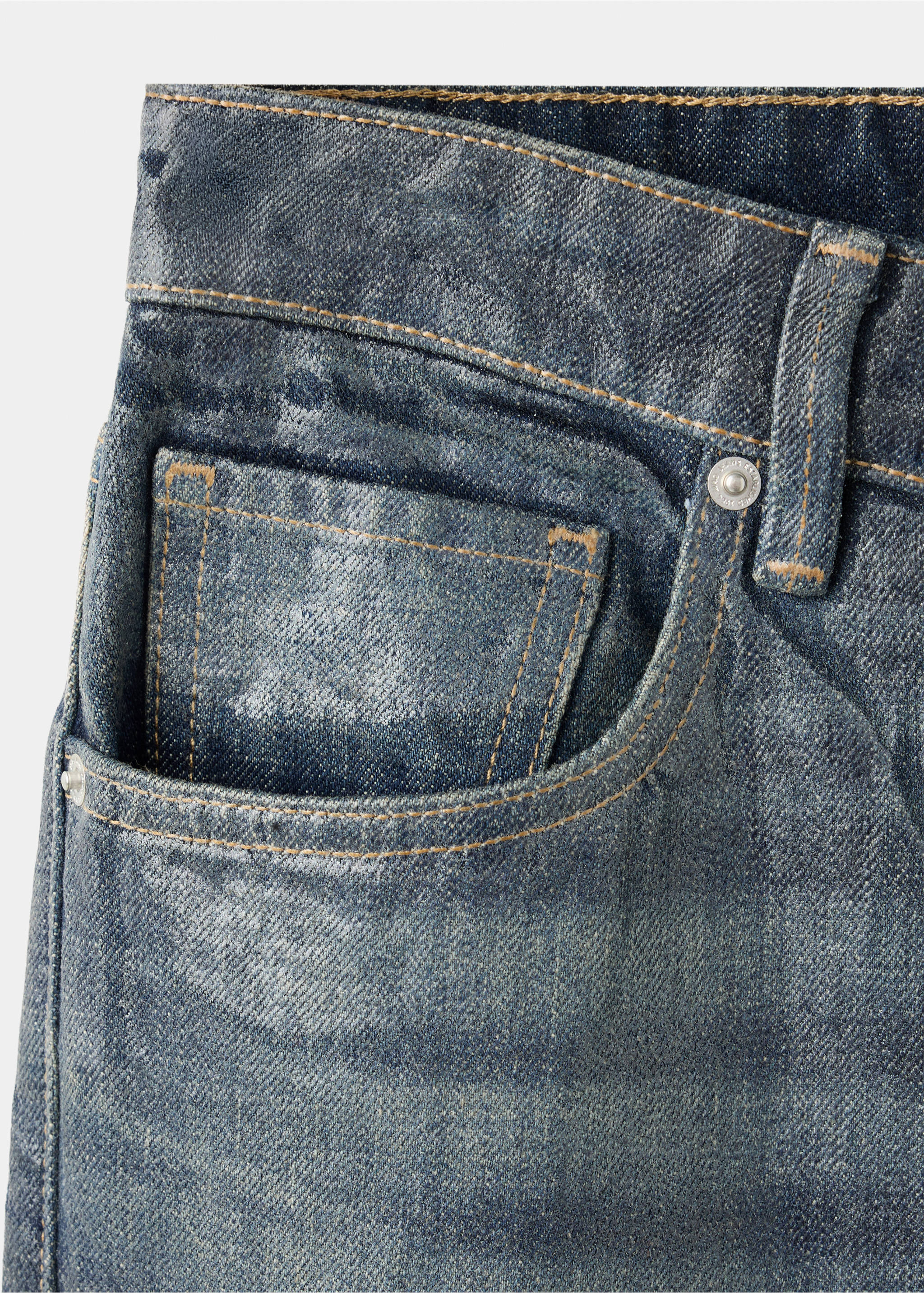 Close-up of dark blue denim trousers showing the coin pocket and contrast topstitching., Dark Blue. Ref: 37079138-00.
